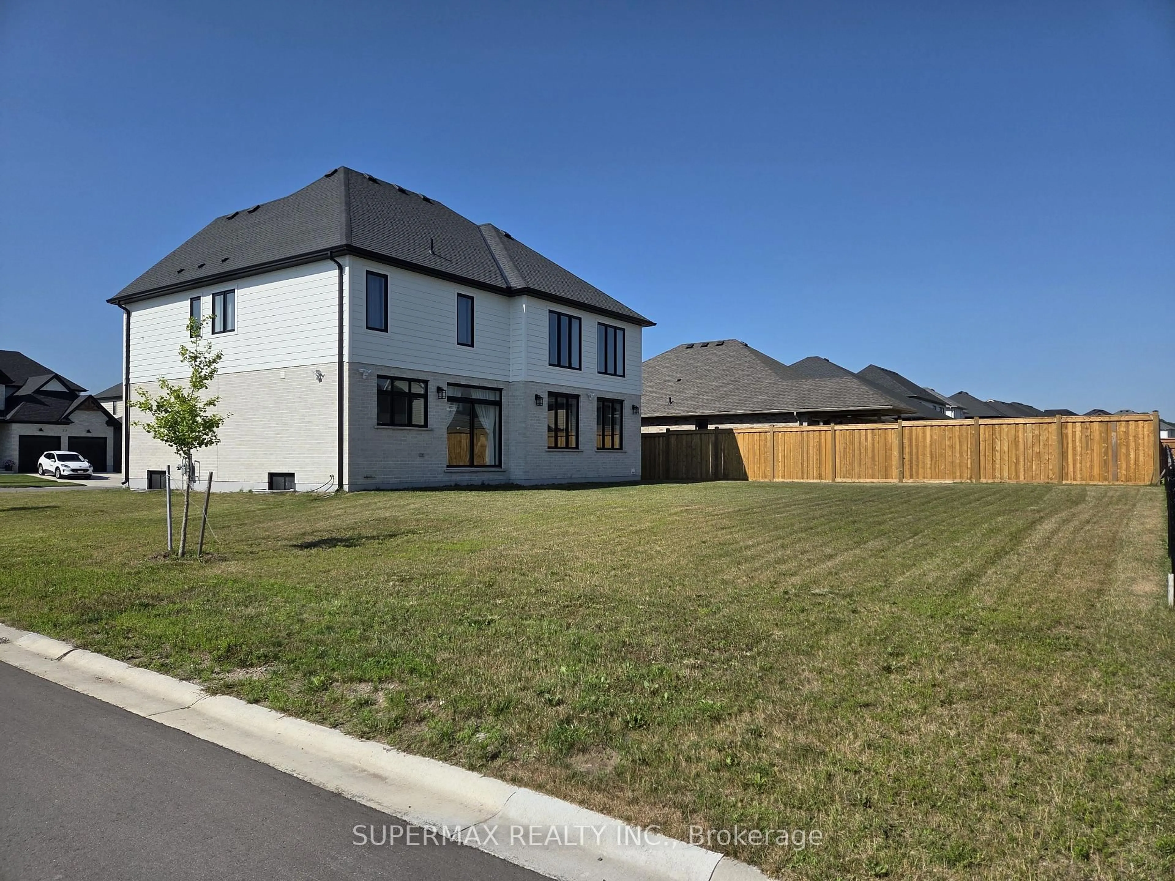 A pic from outside/outdoor area/front of a property/back of a property/a pic from drone, street for 76 Hazelwood Pass, Thames Centre Ontario N0L 1G5