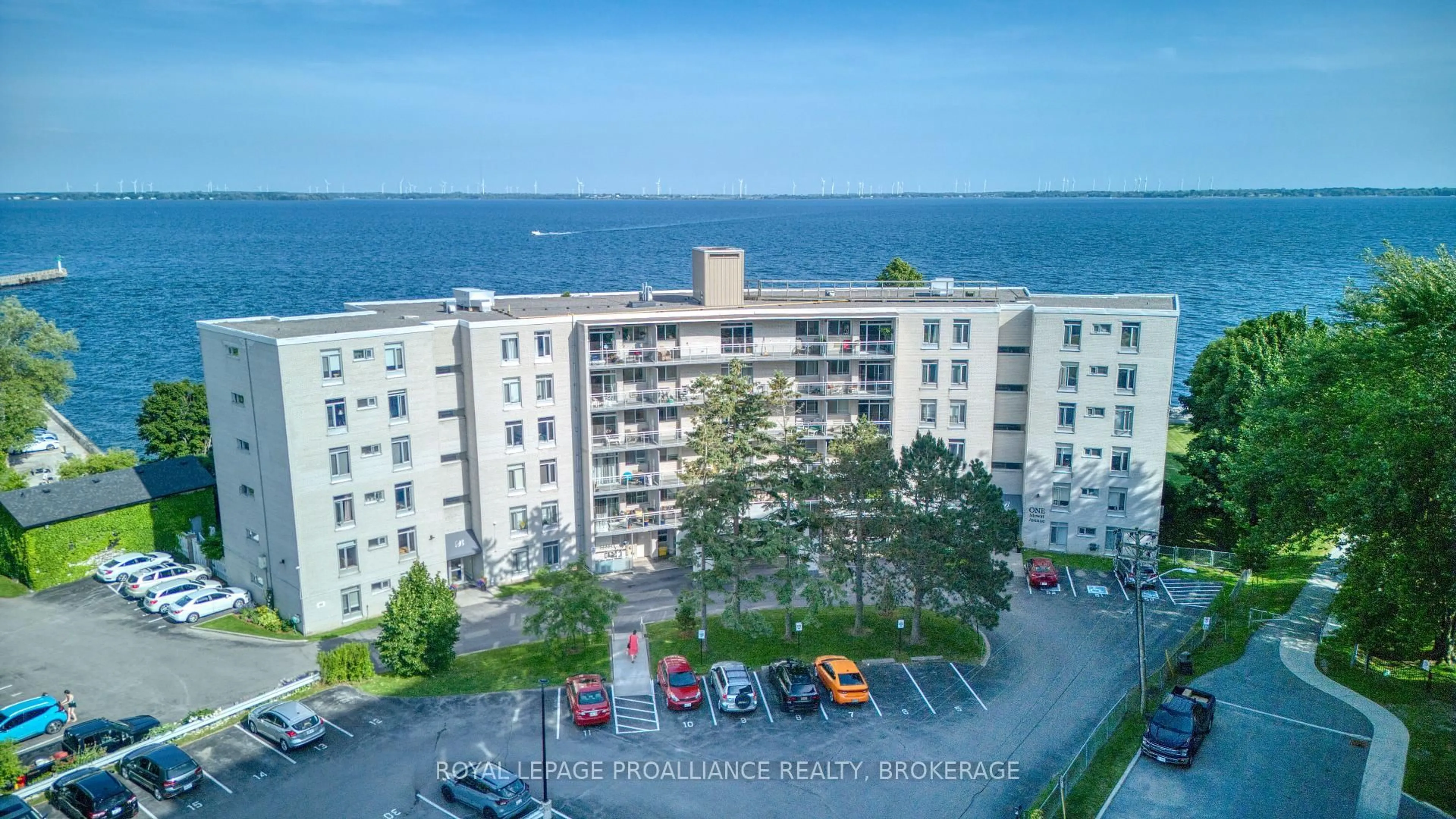 A pic from outside/outdoor area/front of a property/back of a property/a pic from drone, water/lake/river/ocean view for 1 Mowat Ave #305, Kingston Ontario K7M 1J8