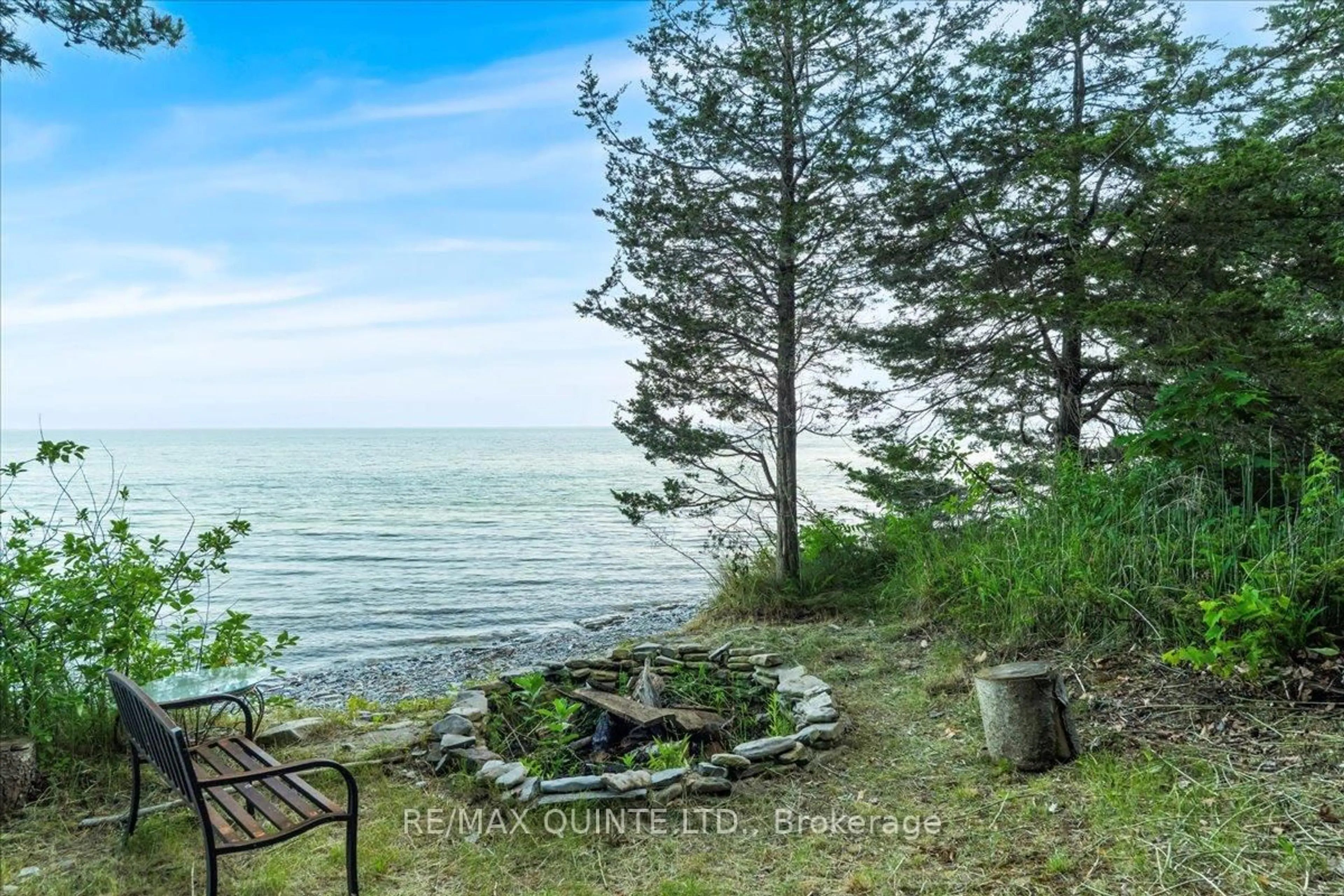 A pic from outside/outdoor area/front of a property/back of a property/a pic from drone, water/lake/river/ocean view for 102 Dorenberg Lane, Prince Edward County Ontario K0K 2T0