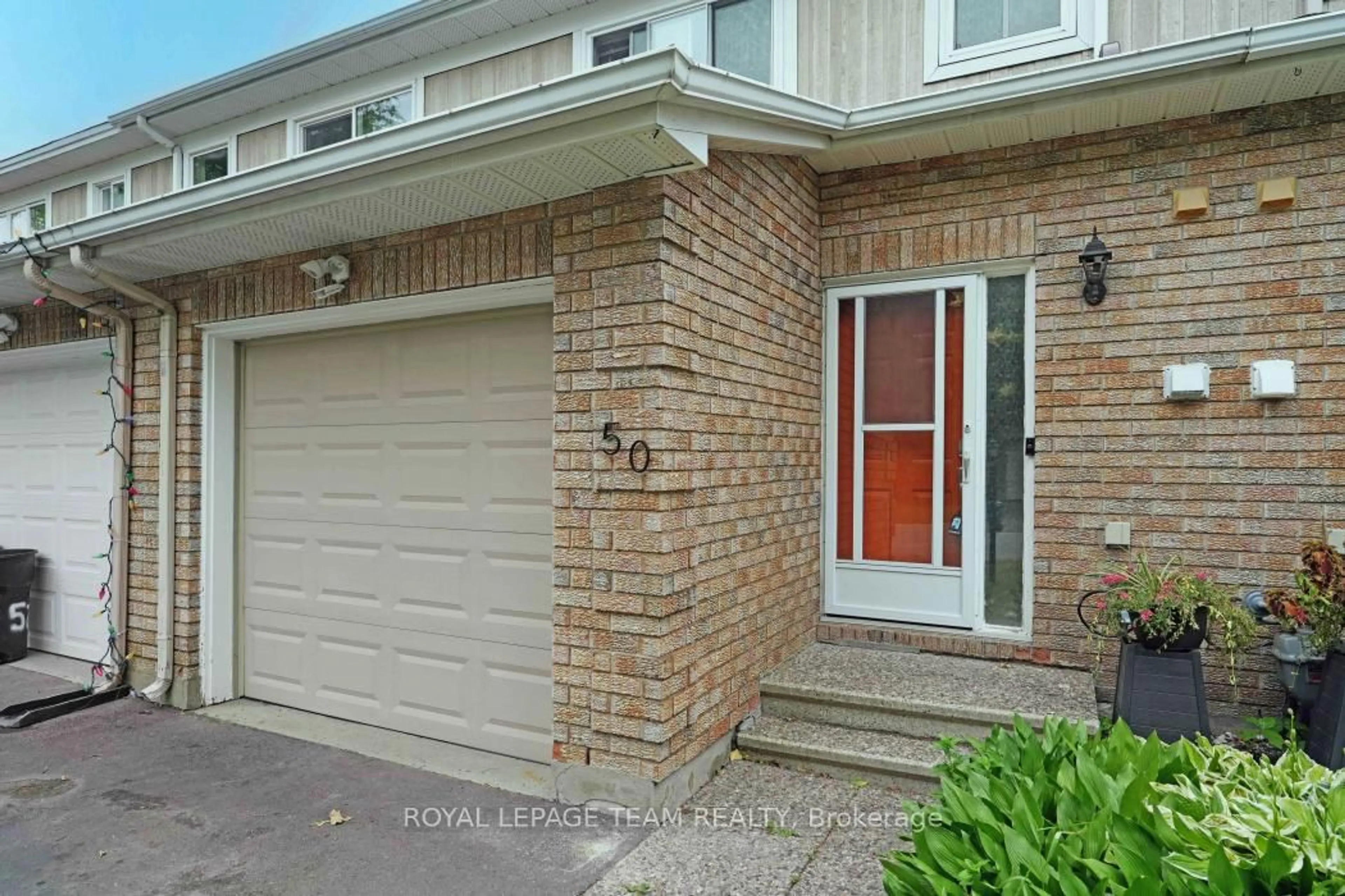 Home with brick exterior material, street for 50 Hummingbird Cres, Ottawa Ontario K2J 3A4
