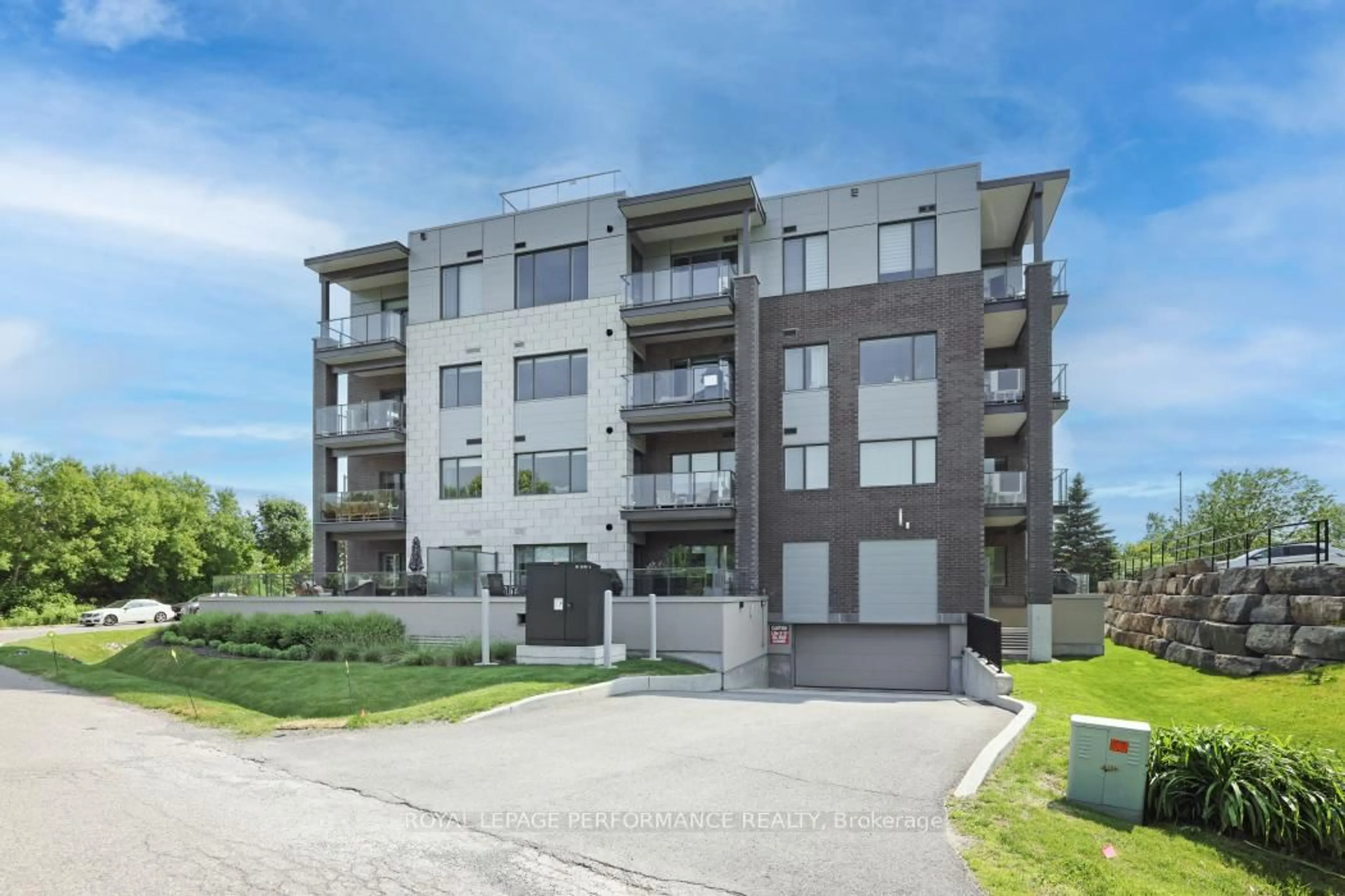 A pic from outside/outdoor area/front of a property/back of a property/a pic from drone, unknown for 280 Herzberg Rd #Unit 308, Ottawa Ontario K2A 1H1