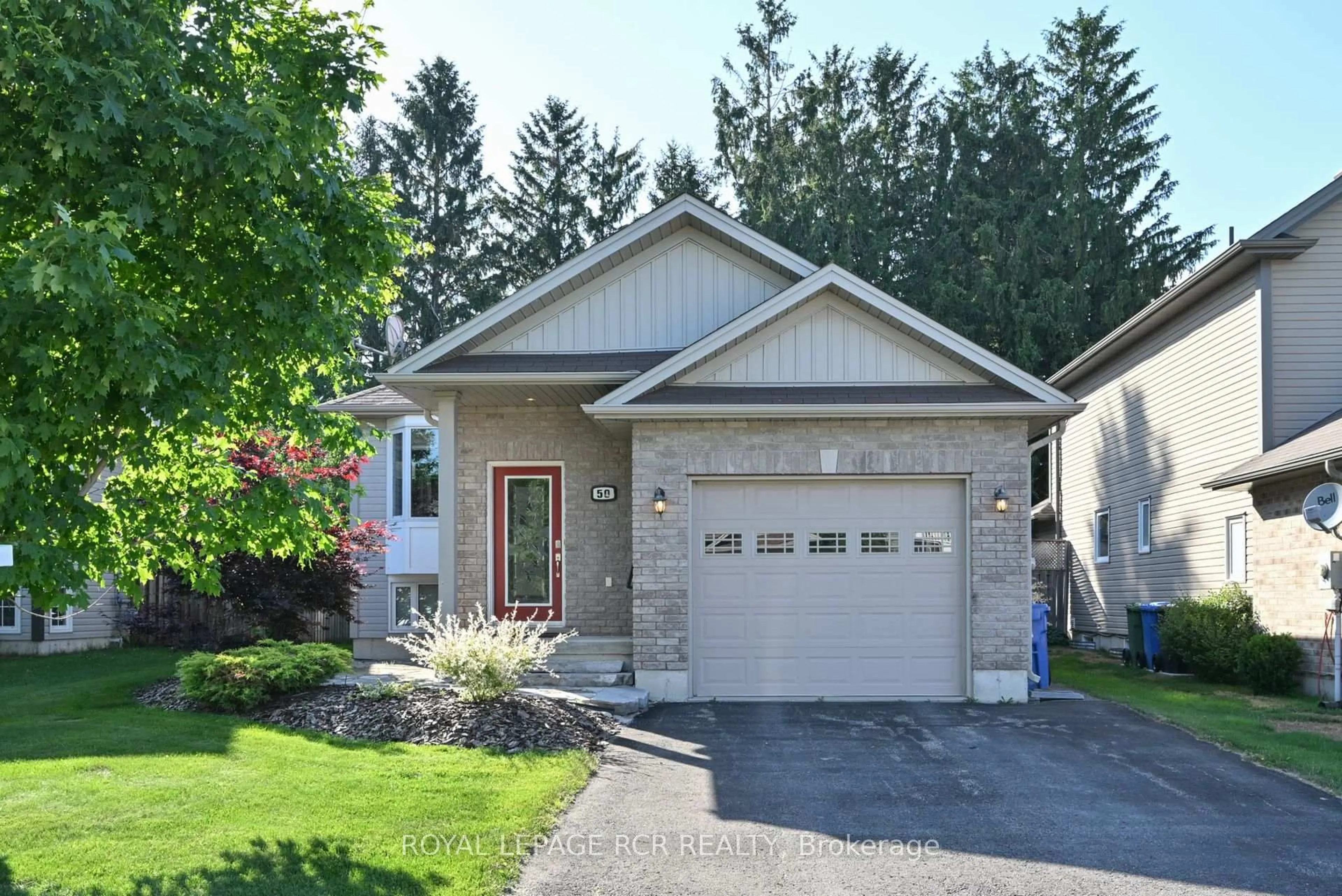 Home with vinyl exterior material, street for 50 Sheffield St, Southgate Ontario N0C 1B0