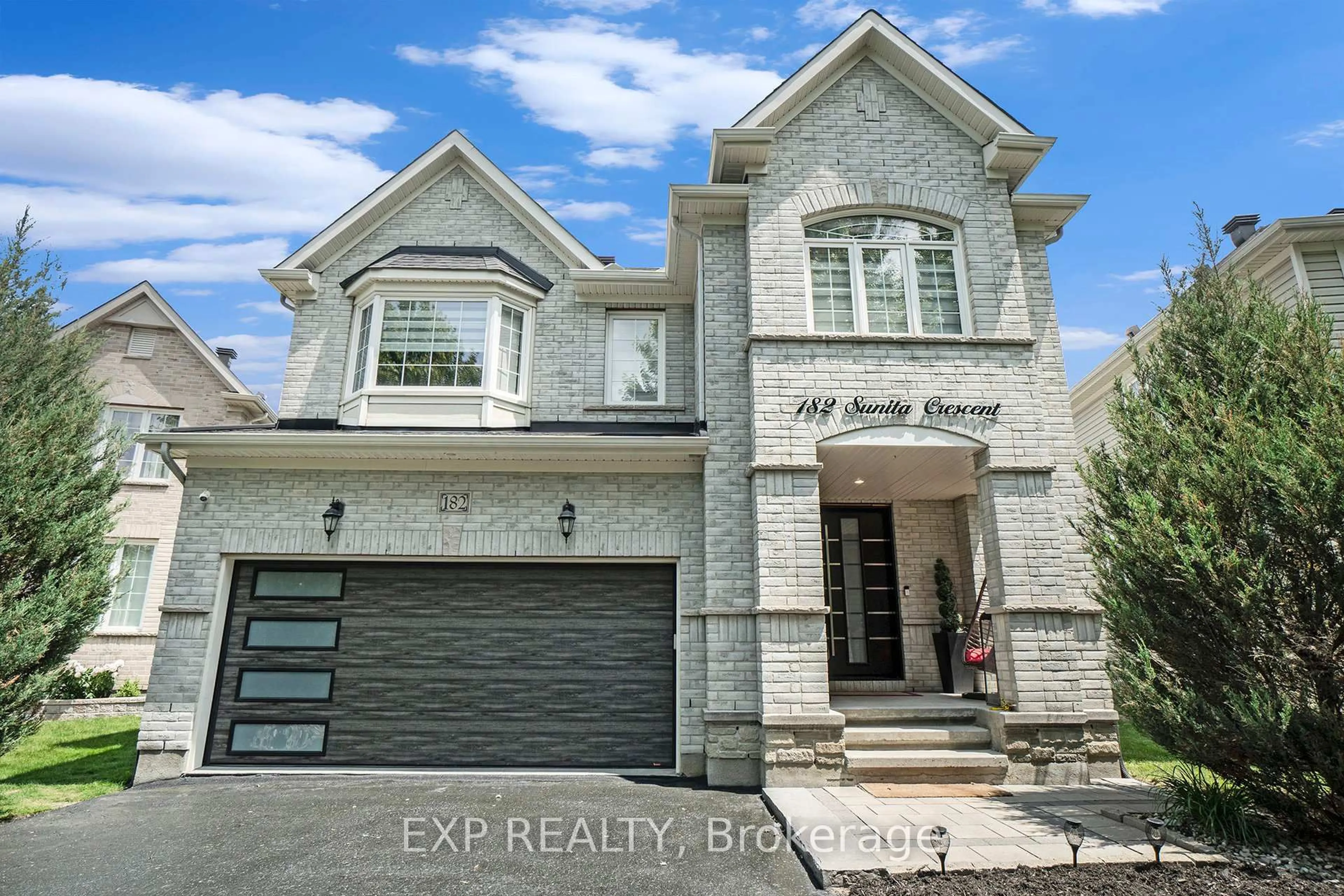 Home with brick exterior material, street for 182 Sunita Cres, Ottawa Ontario K2J 5S8