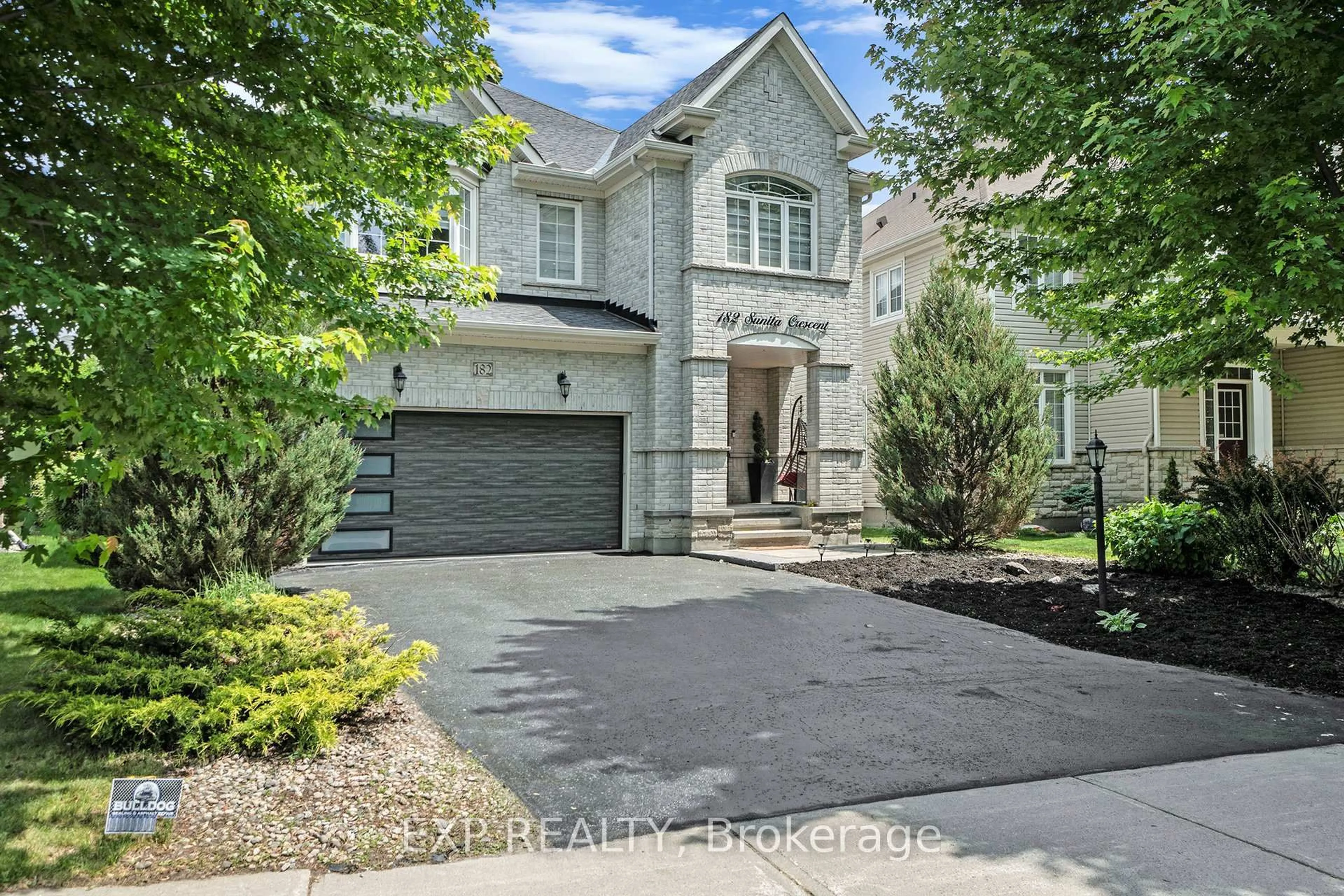 Home with brick exterior material, street for 182 Sunita Cres, Ottawa Ontario K2J 5S8
