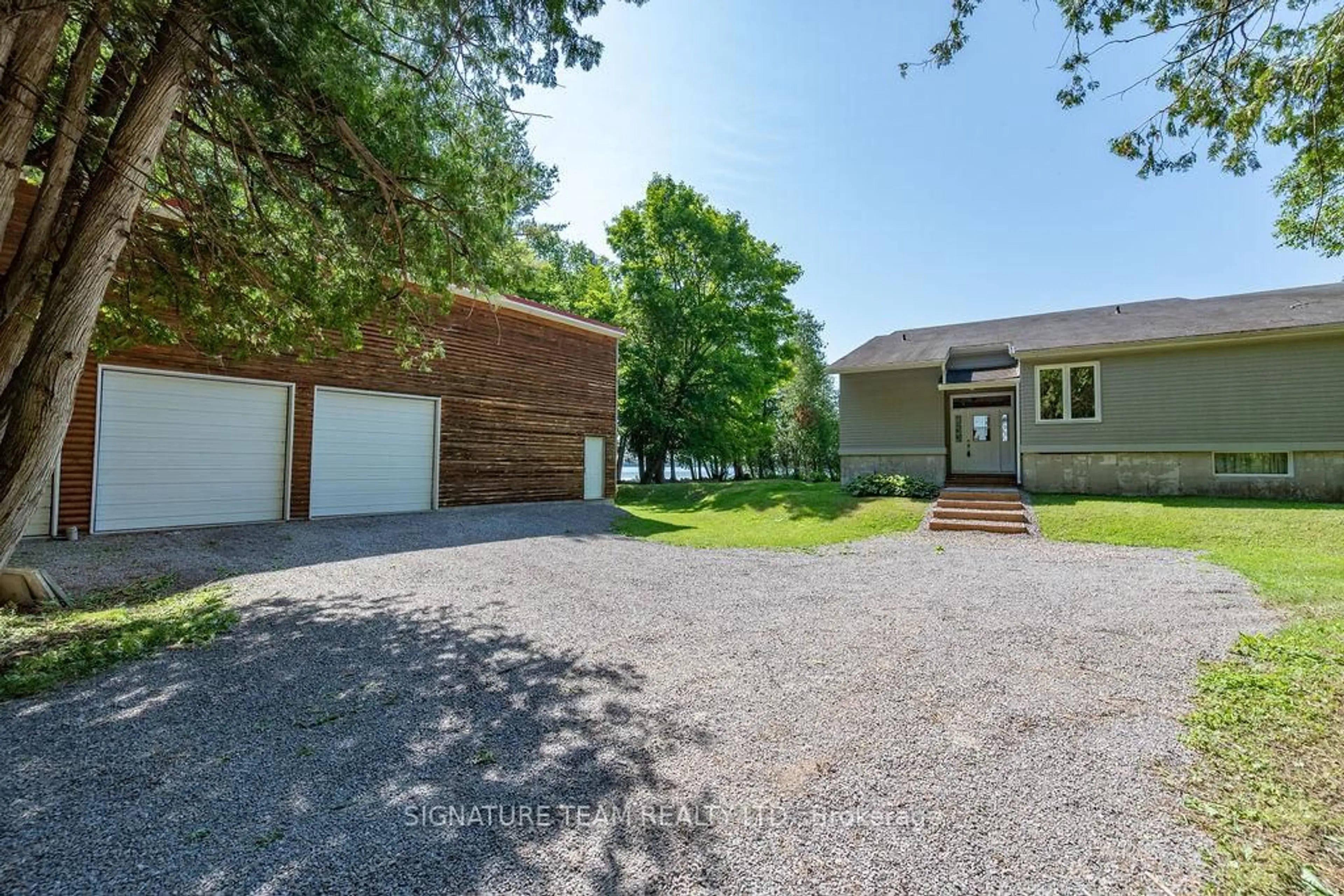 A pic from outside/outdoor area/front of a property/back of a property/a pic from drone, water/lake/river/ocean view for 811 Violet Lane, Eganville Ontario K0J 1T0