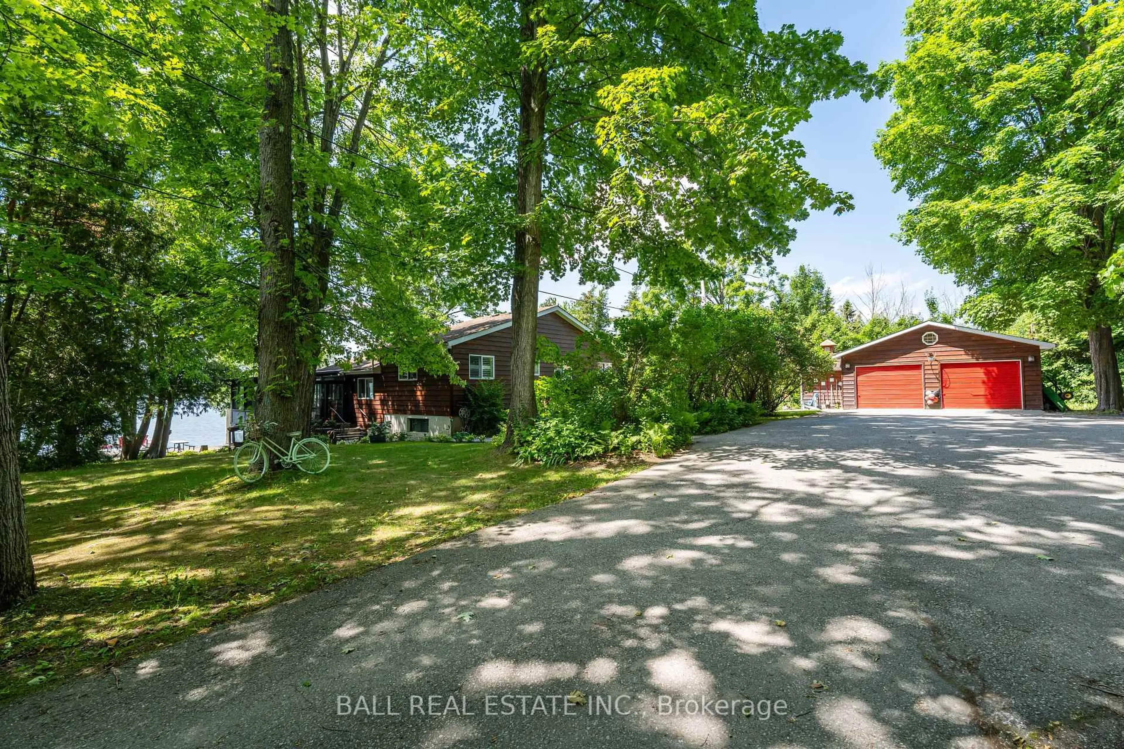 A pic from outside/outdoor area/front of a property/back of a property/a pic from drone, water/lake/river/ocean view for 2466 Fire Route 13, Selwyn Ontario K0L 2H0