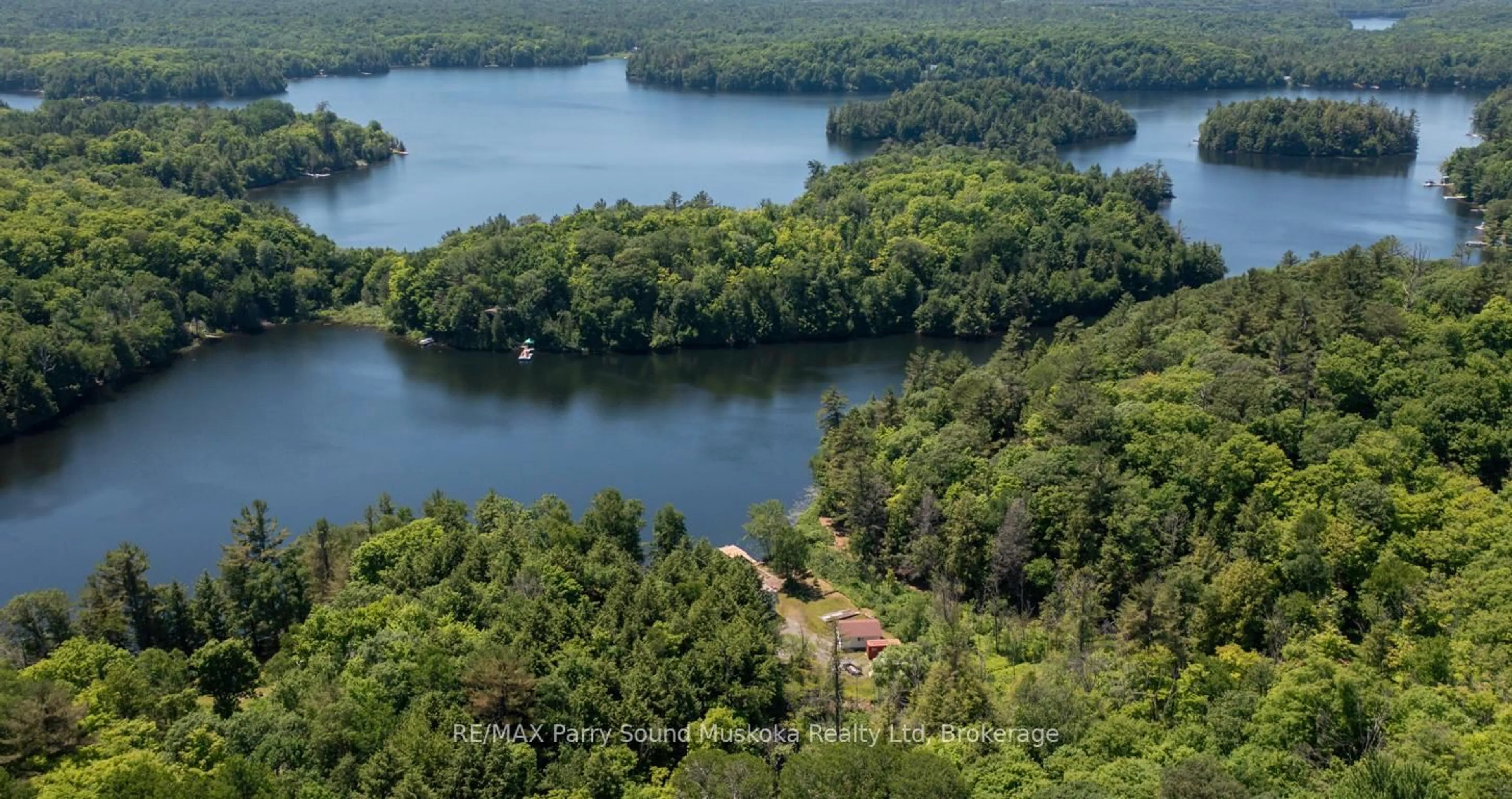 A pic from outside/outdoor area/front of a property/back of a property/a pic from drone, water/lake/river/ocean view for 18 Karhu Lane, Seguin Ontario P2A 2W8