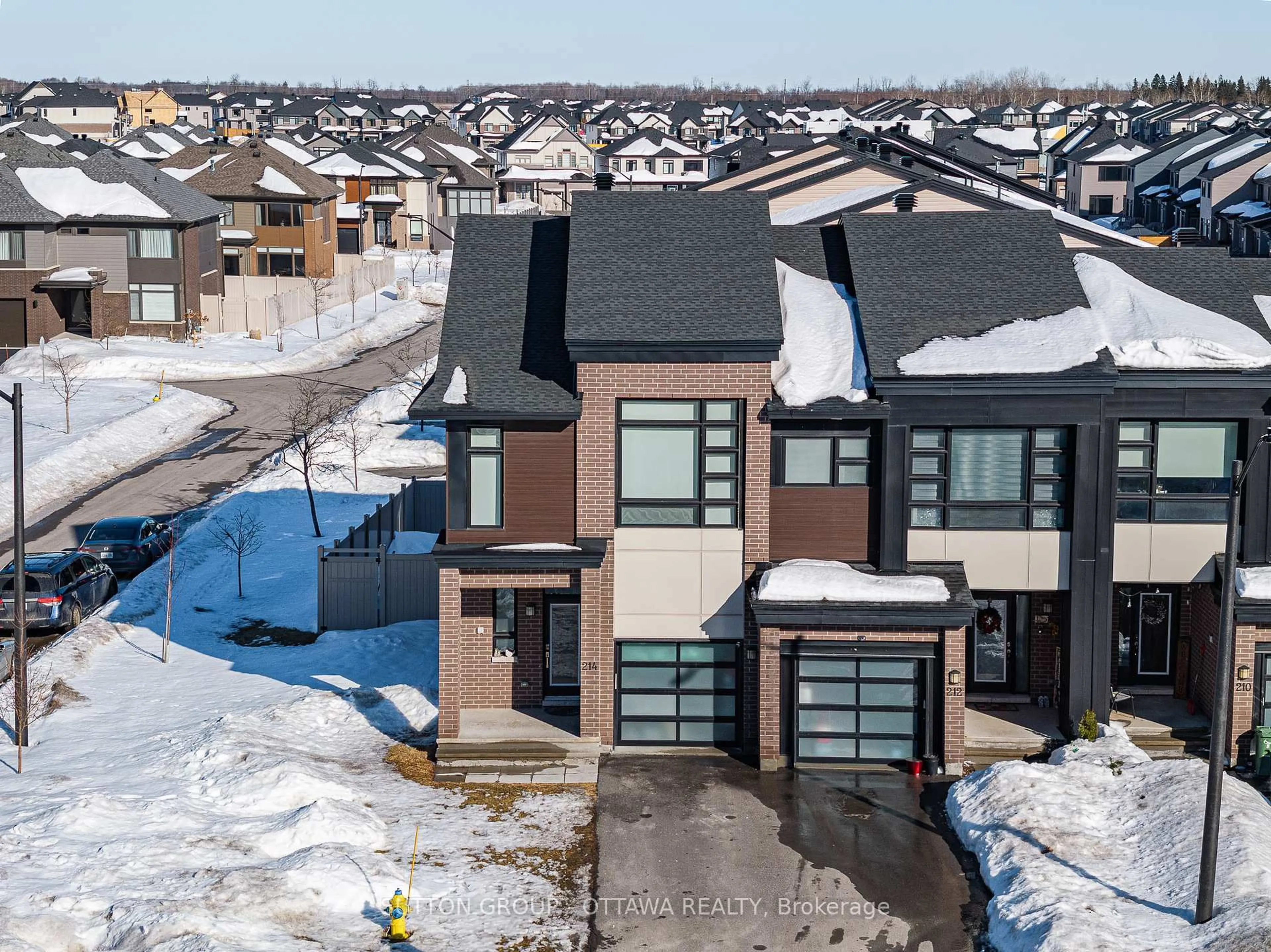 A pic from outside/outdoor area/front of a property/back of a property/a pic from drone, street for 214 Big Dipper St, Manotick Ontario K4M 0K5