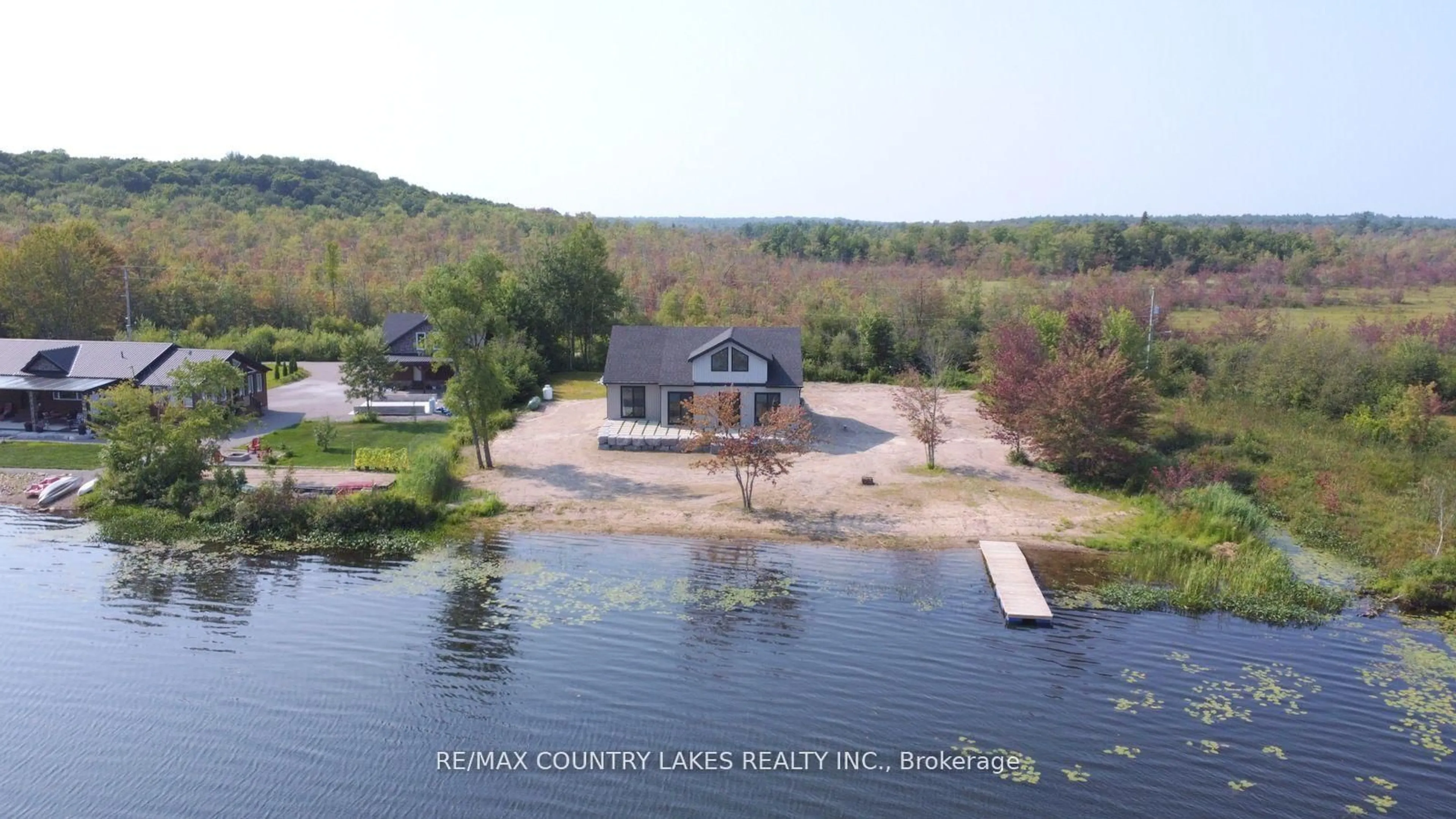 A pic from outside/outdoor area/front of a property/back of a property/a pic from drone, water/lake/river/ocean view for 130 Baker Blvd, Kawartha Lakes Ontario K0M 2B0