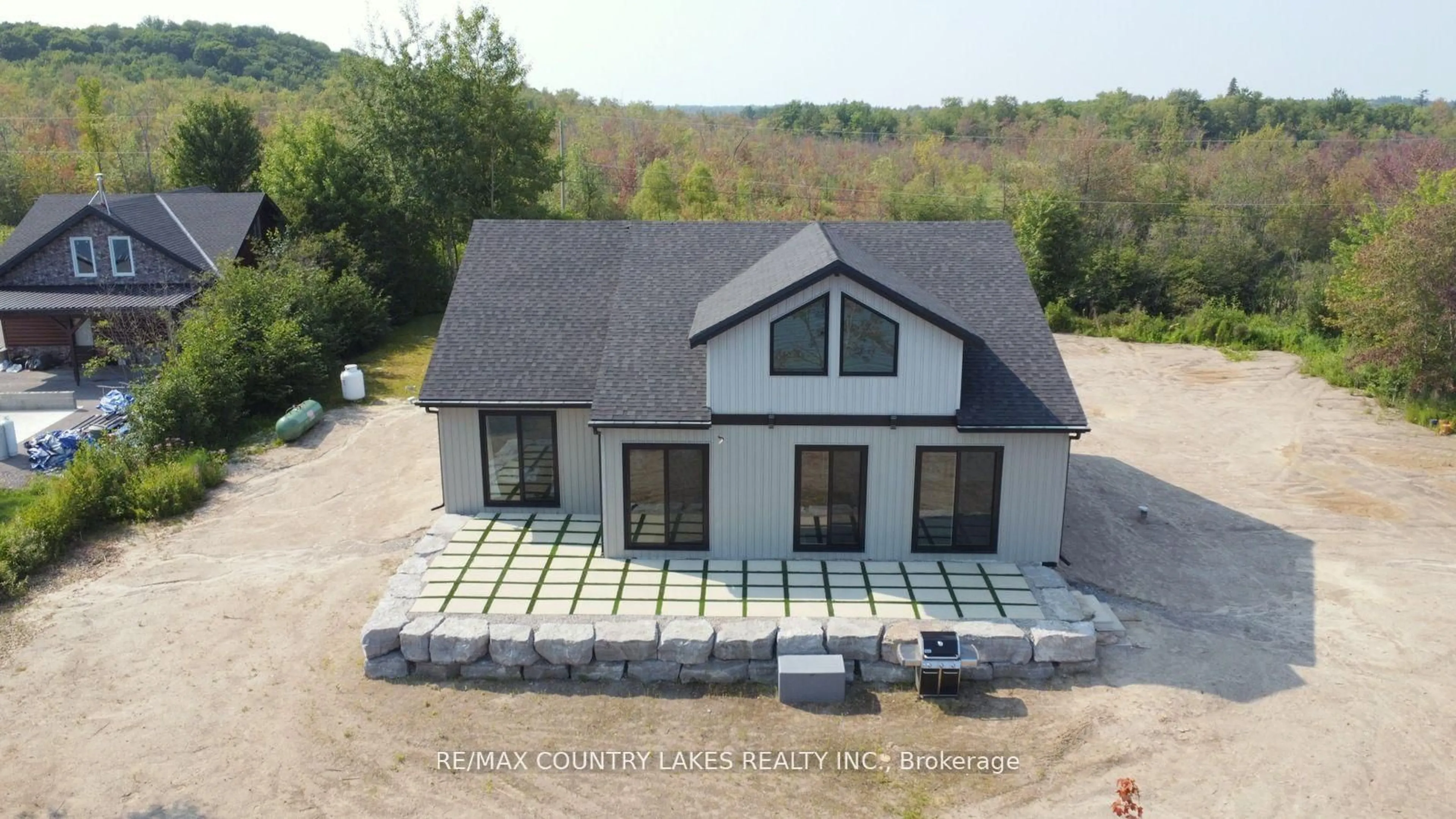 A pic from outside/outdoor area/front of a property/back of a property/a pic from drone, building for 130 Baker Blvd, Kawartha Lakes Ontario K0M 2B0