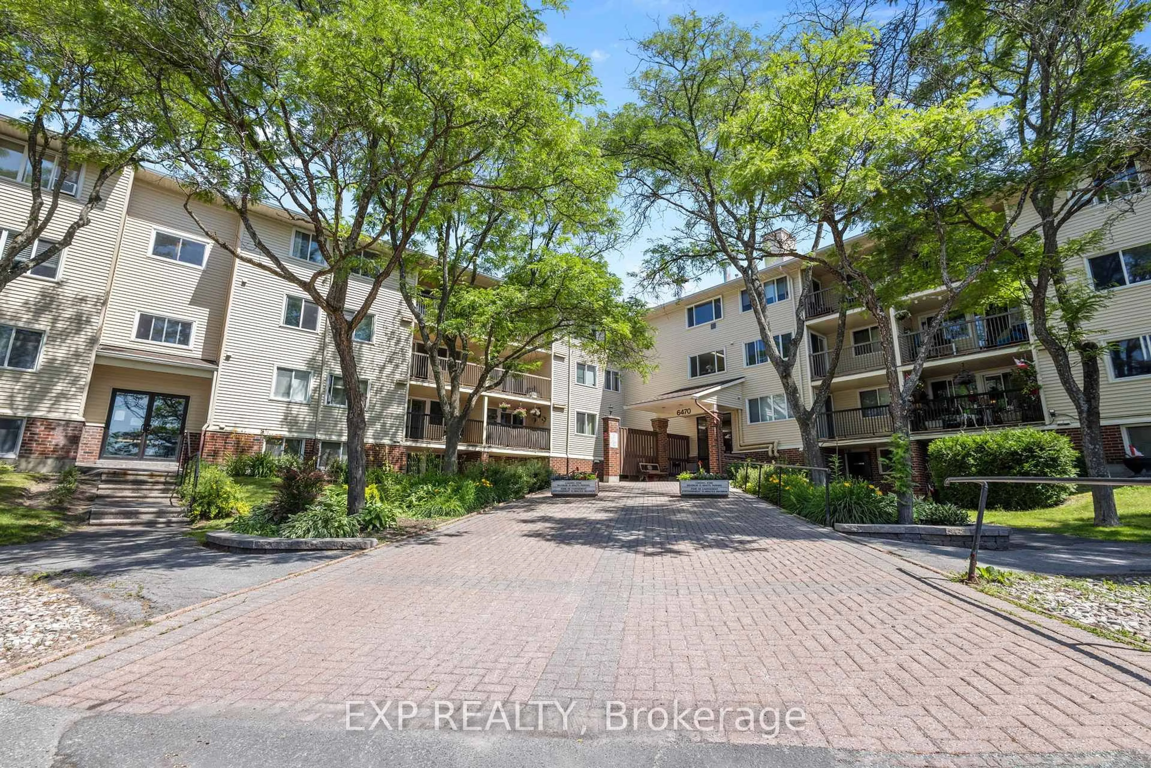 A pic from outside/outdoor area/front of a property/back of a property/a pic from drone, street for 6470 BILBERRY Dr #106, Ottawa Ontario K1C 4P1