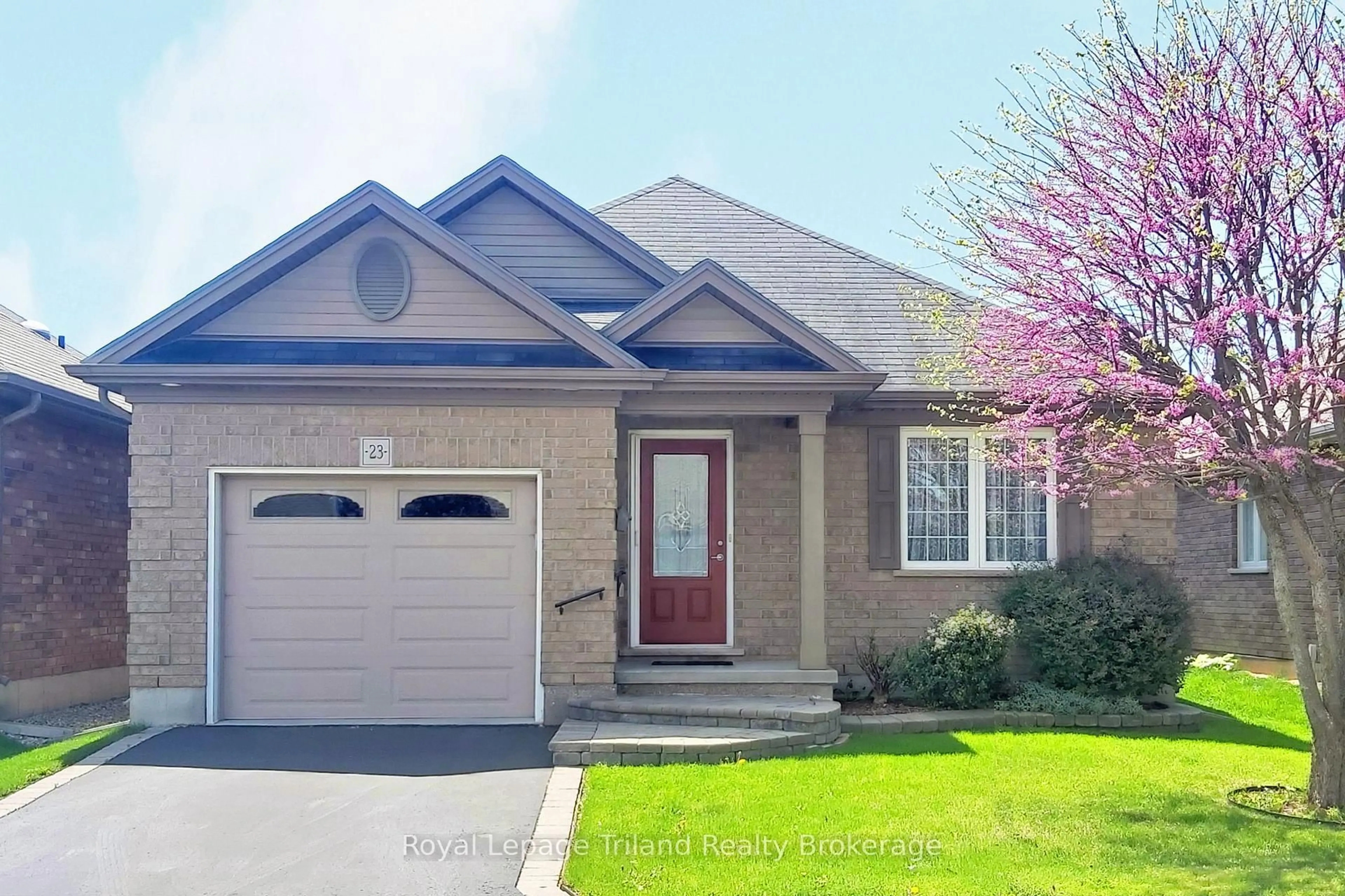 Home with brick exterior material, street for 23 Hogarth Dr, Tillsonburg Ontario N4G 0C2