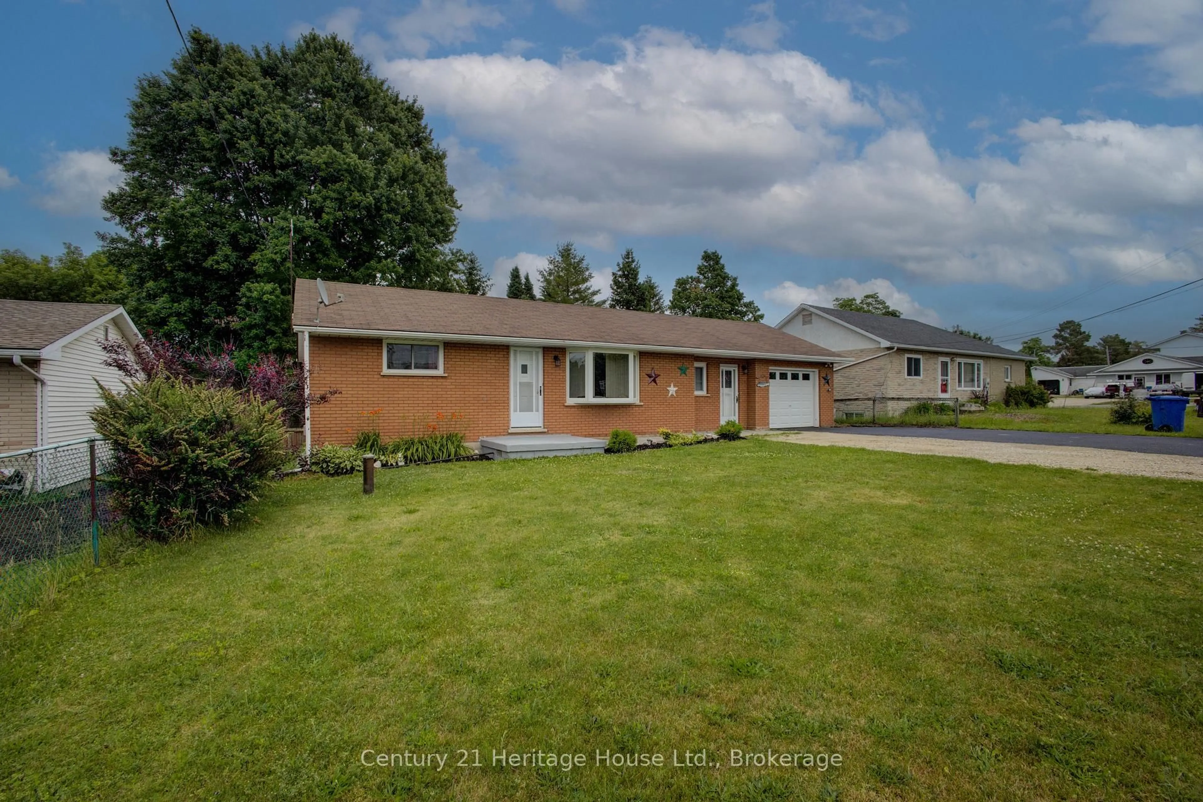 A pic from outside/outdoor area/front of a property/back of a property/a pic from drone, street for 313003 Hwy  6 Highway, Southgate Ontario N0G 1R0