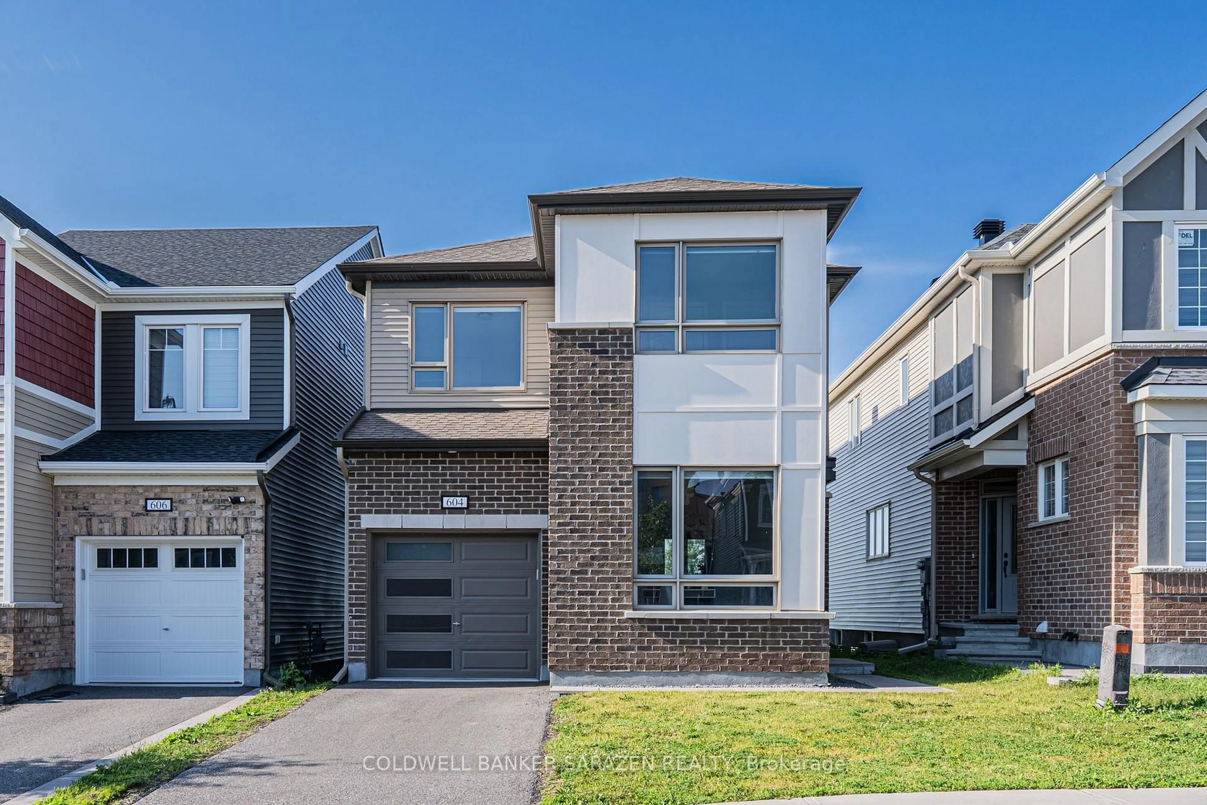 Home with brick exterior material, street for 604 Perseus Ave, Ottawa Ontario K2J 6S7