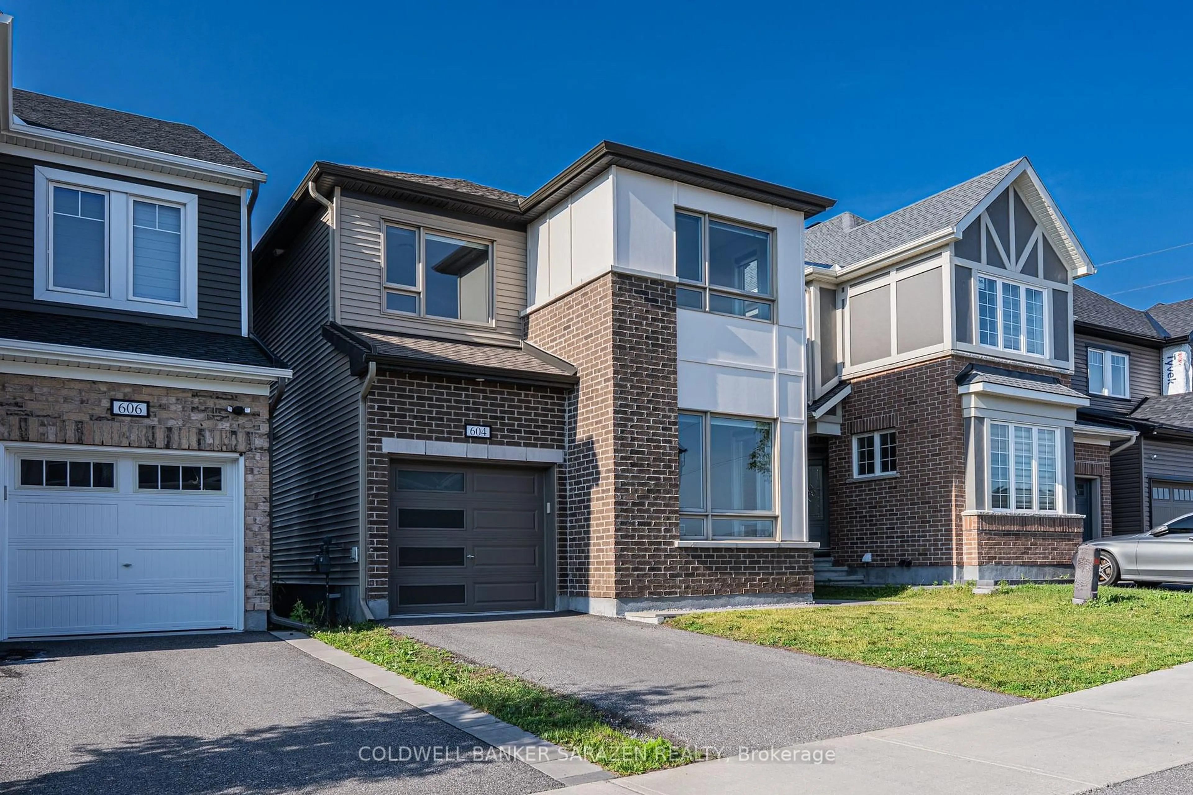 Home with brick exterior material, street for 604 Perseus Ave, Ottawa Ontario K2J 6S7