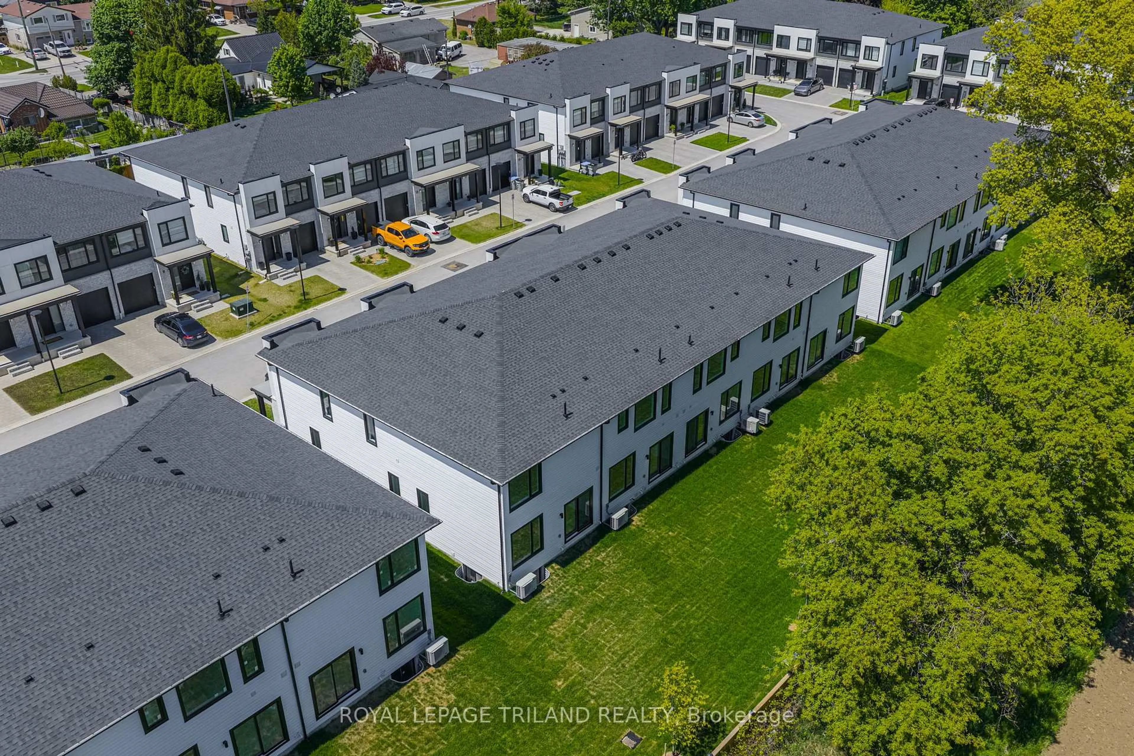 A pic from outside/outdoor area/front of a property/back of a property/a pic from drone, unknown for 101 SWALES Ave #2, Strathroy-Caradoc Ontario N7G 0C1