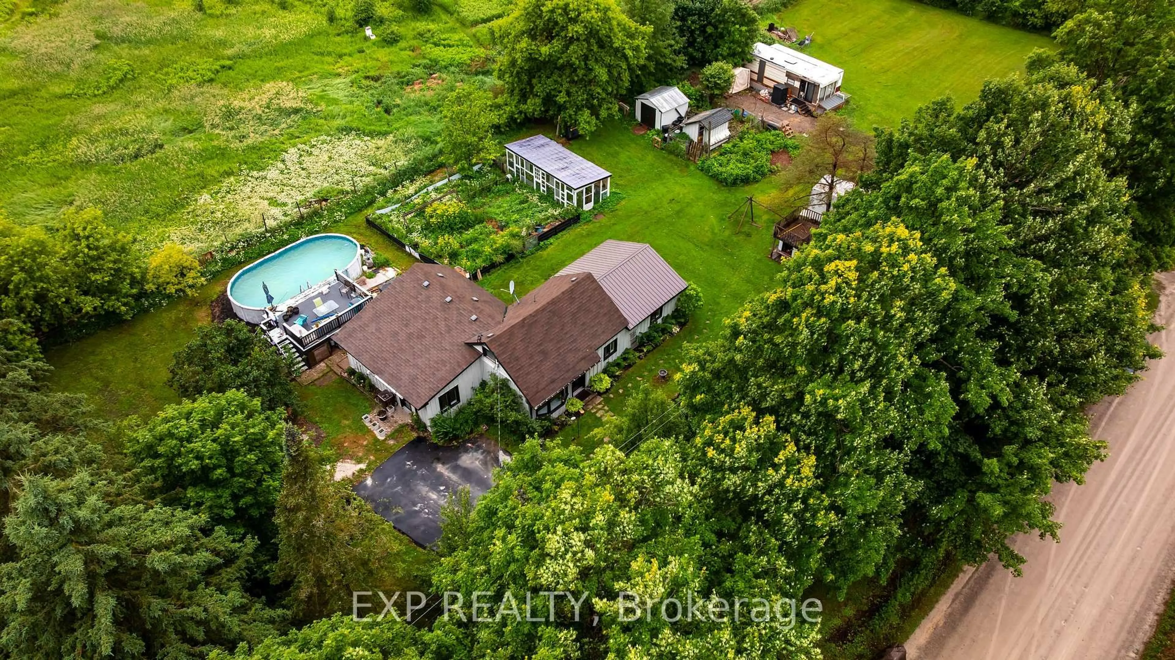 A pic from outside/outdoor area/front of a property/back of a property/a pic from drone, unknown for 433116 4th Line, Amaranth Ontario L9W 0P1