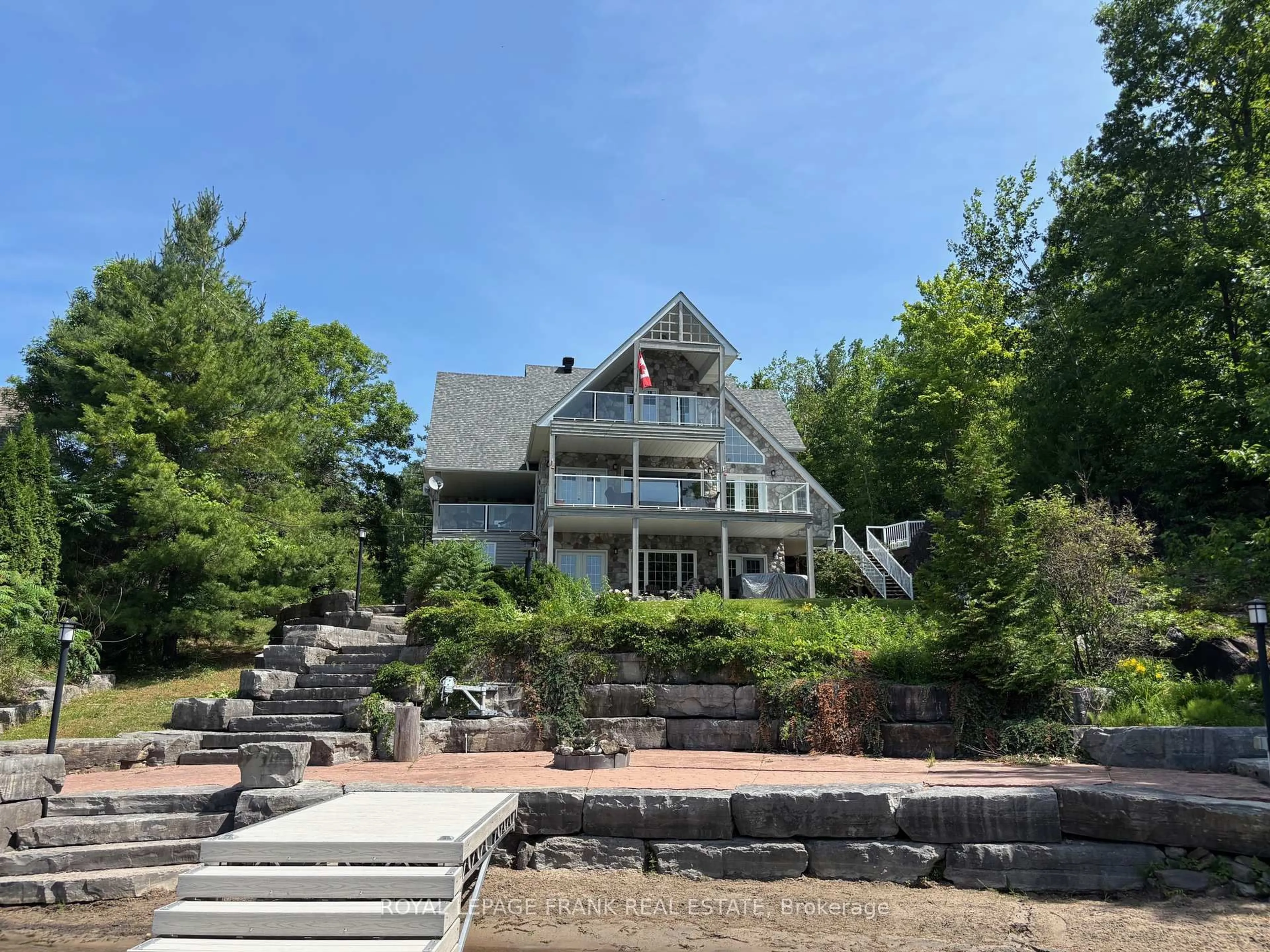 A pic from outside/outdoor area/front of a property/back of a property/a pic from drone, unknown for 88 Fire Route 54, Trent Lakes Ontario K0L 1J0
