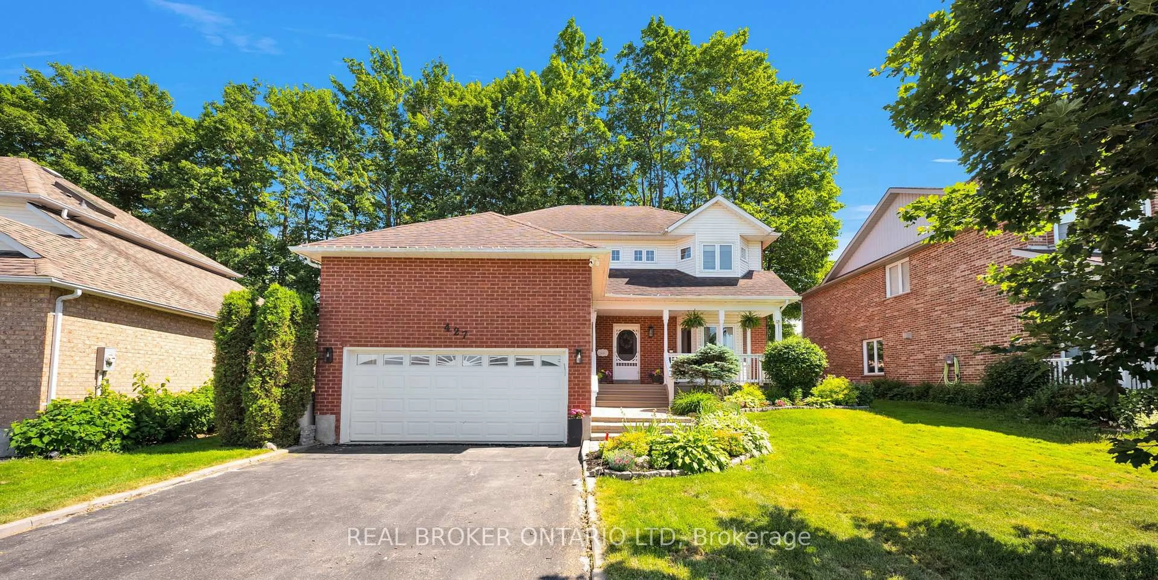 Home with brick exterior material, street for 427 Olde Village Lane, Shelburne Ontario L0N 1S2