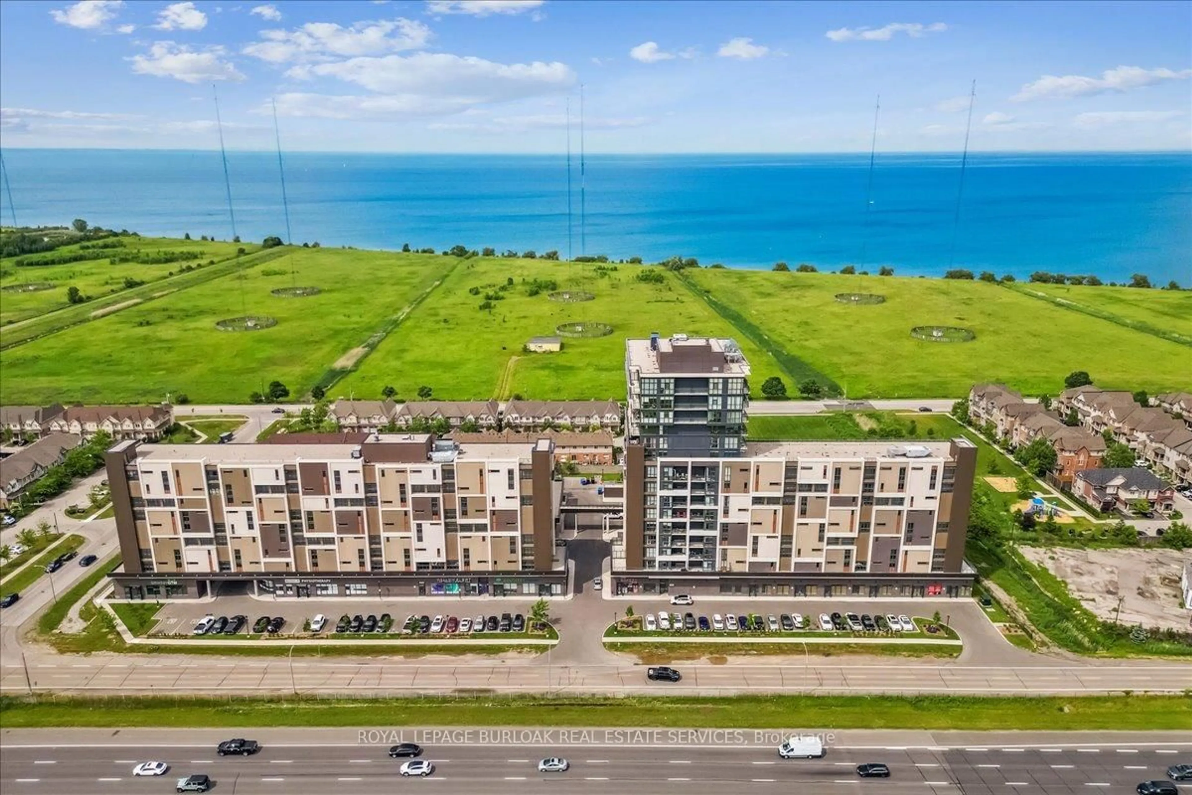 A pic from outside/outdoor area/front of a property/back of a property/a pic from drone, water/lake/river/ocean view for 550 North Service Rd #806, Grimsby Ontario L3M 0H9