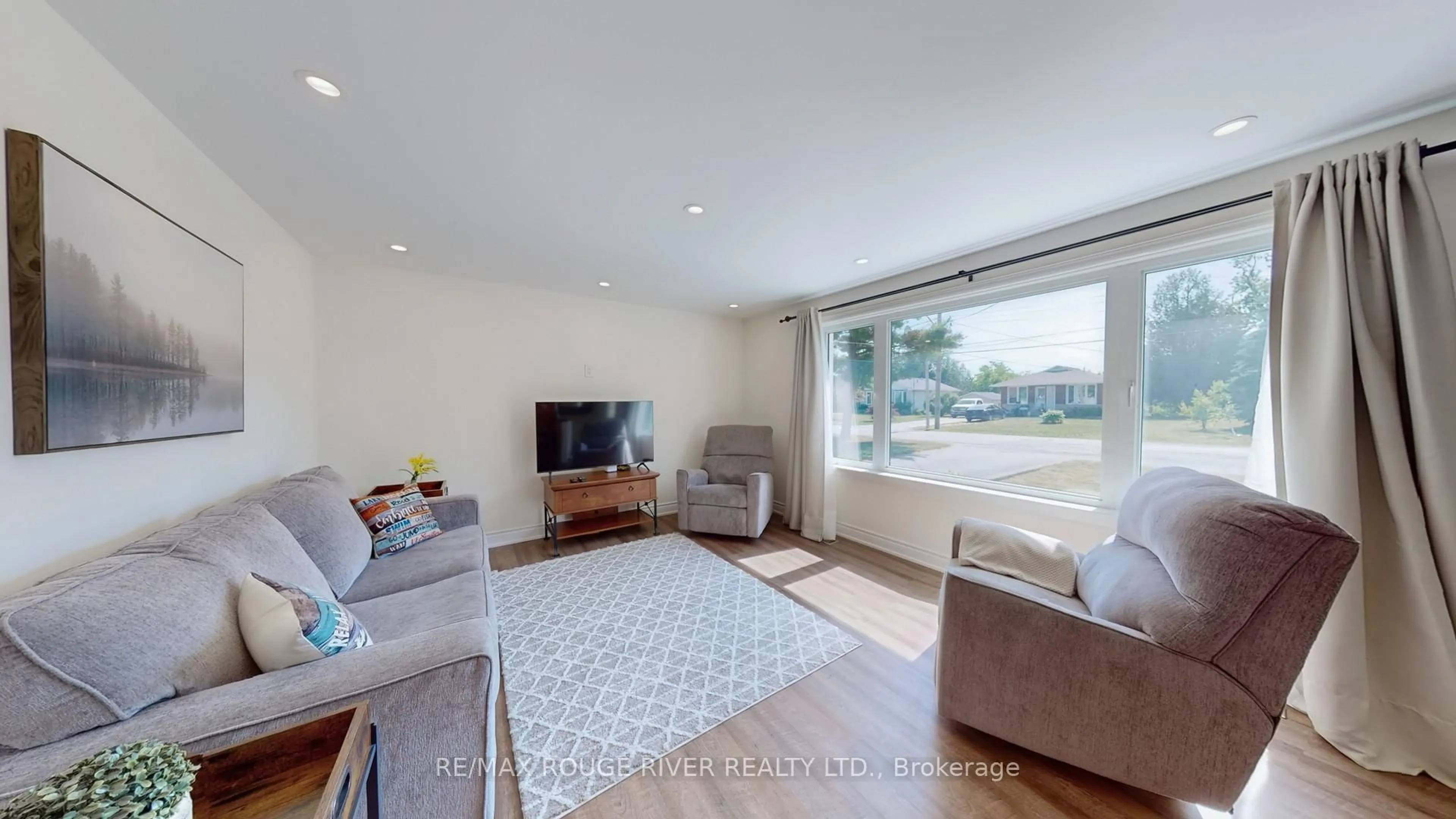 Living room with furniture, wood/laminate floor for 162 Queen St, Kawartha Lakes Ontario K0M 1N0