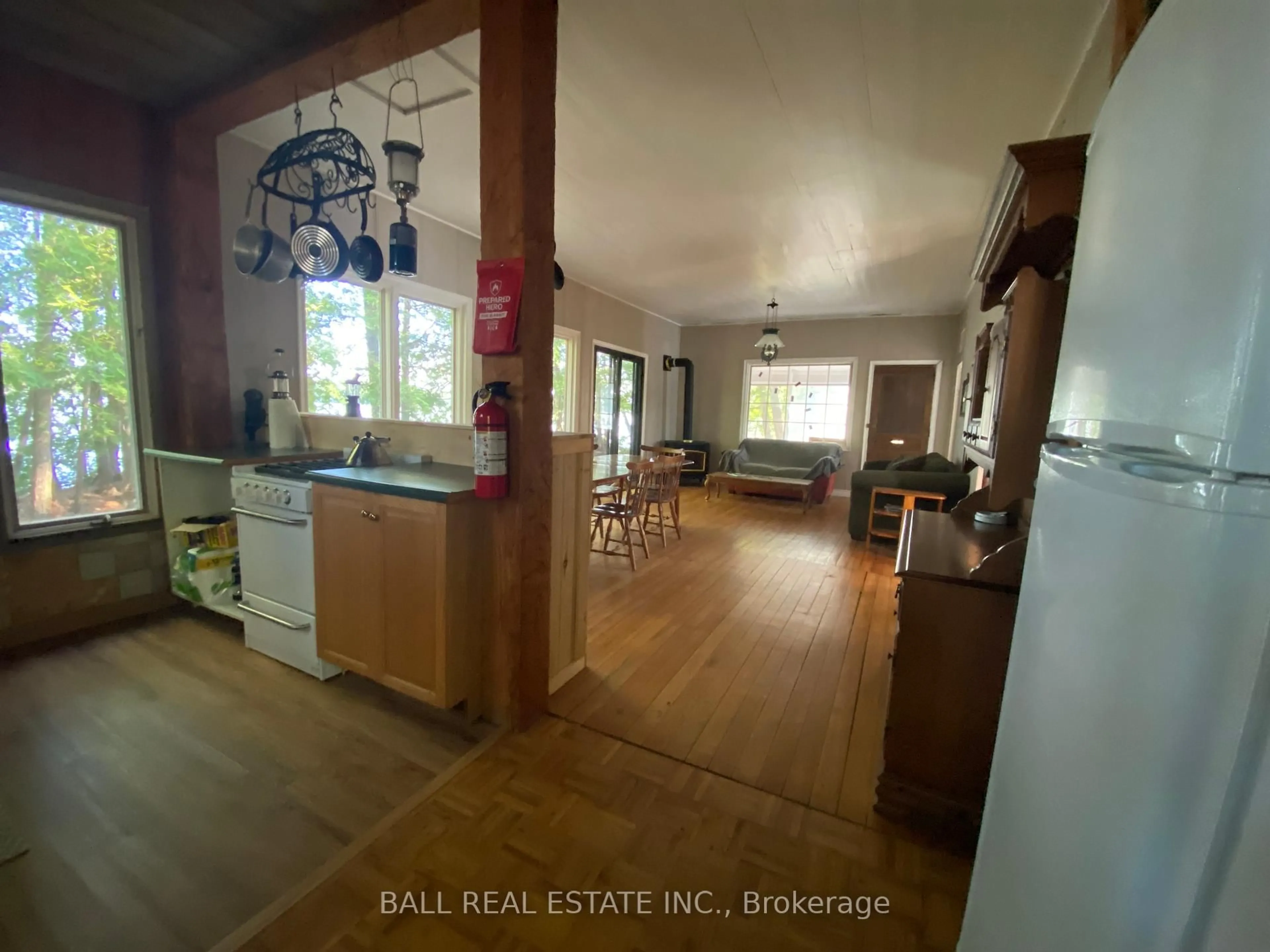 Open concept kitchen, wood/laminate floor for 25 Garden Island - WAO, North Kawartha Ontario K0L 1A0