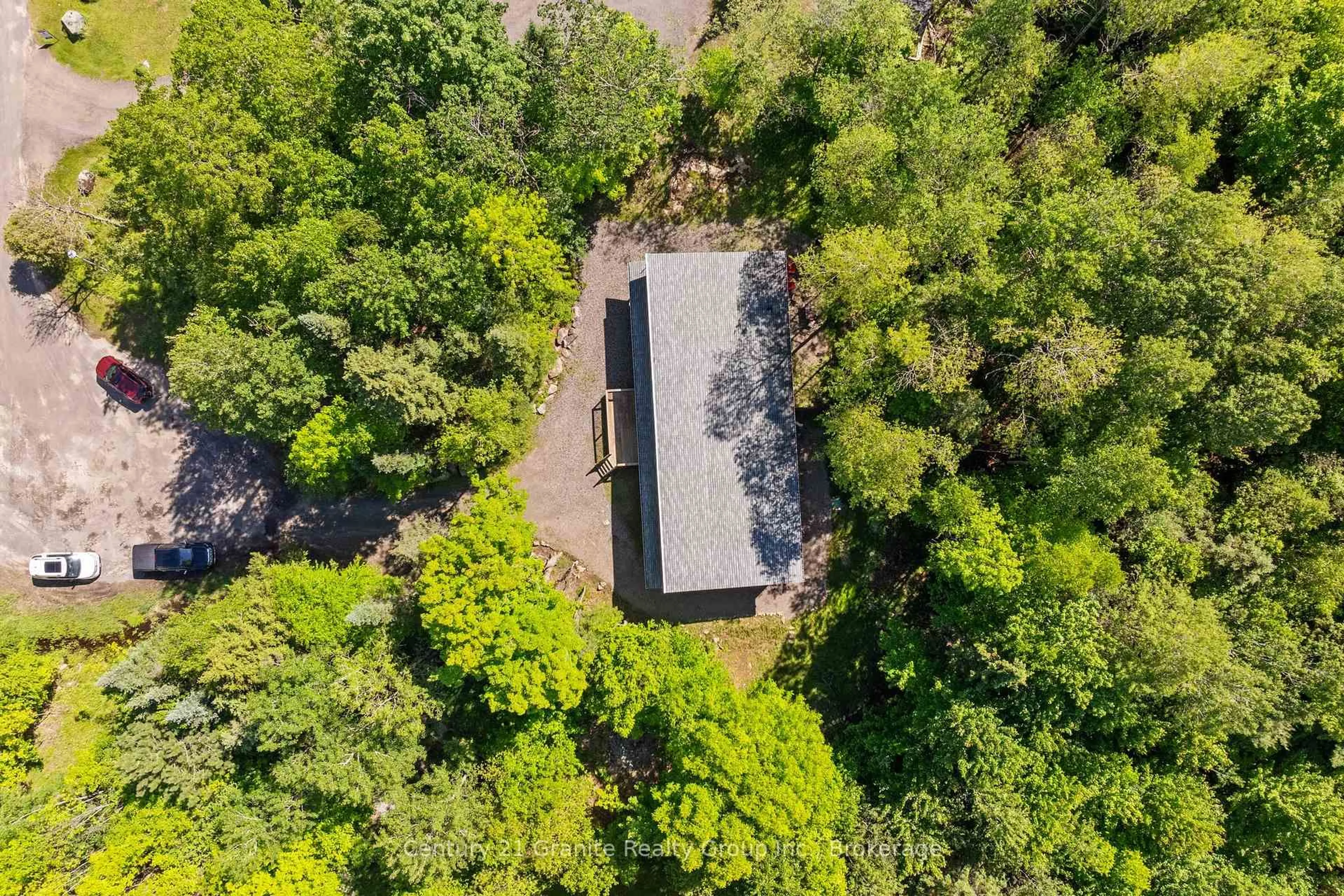 A pic from outside/outdoor area/front of a property/back of a property/a pic from drone, forest/trees view for 51 FARMCREST Ave, Dysart et al Ontario K0M 1S0
