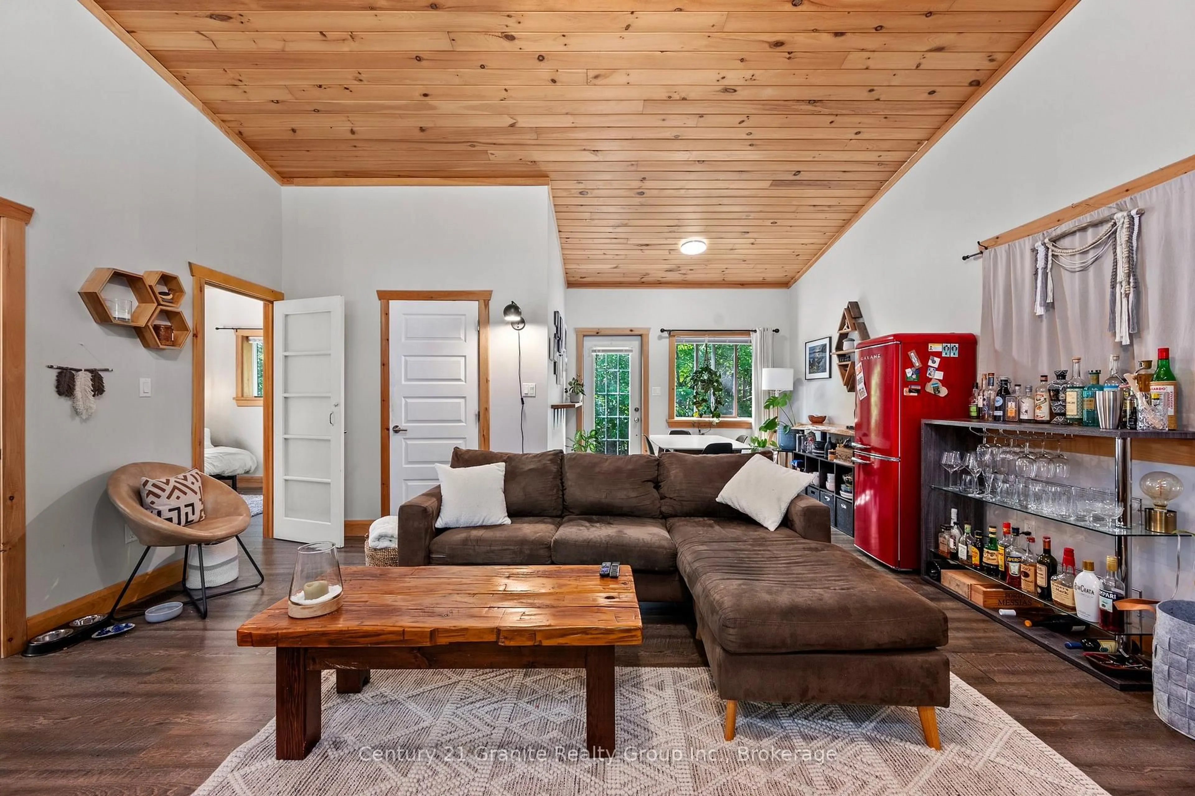 Living room with furniture, wood/laminate floor for 51 FARMCREST Ave, Dysart et al Ontario K0M 1S0