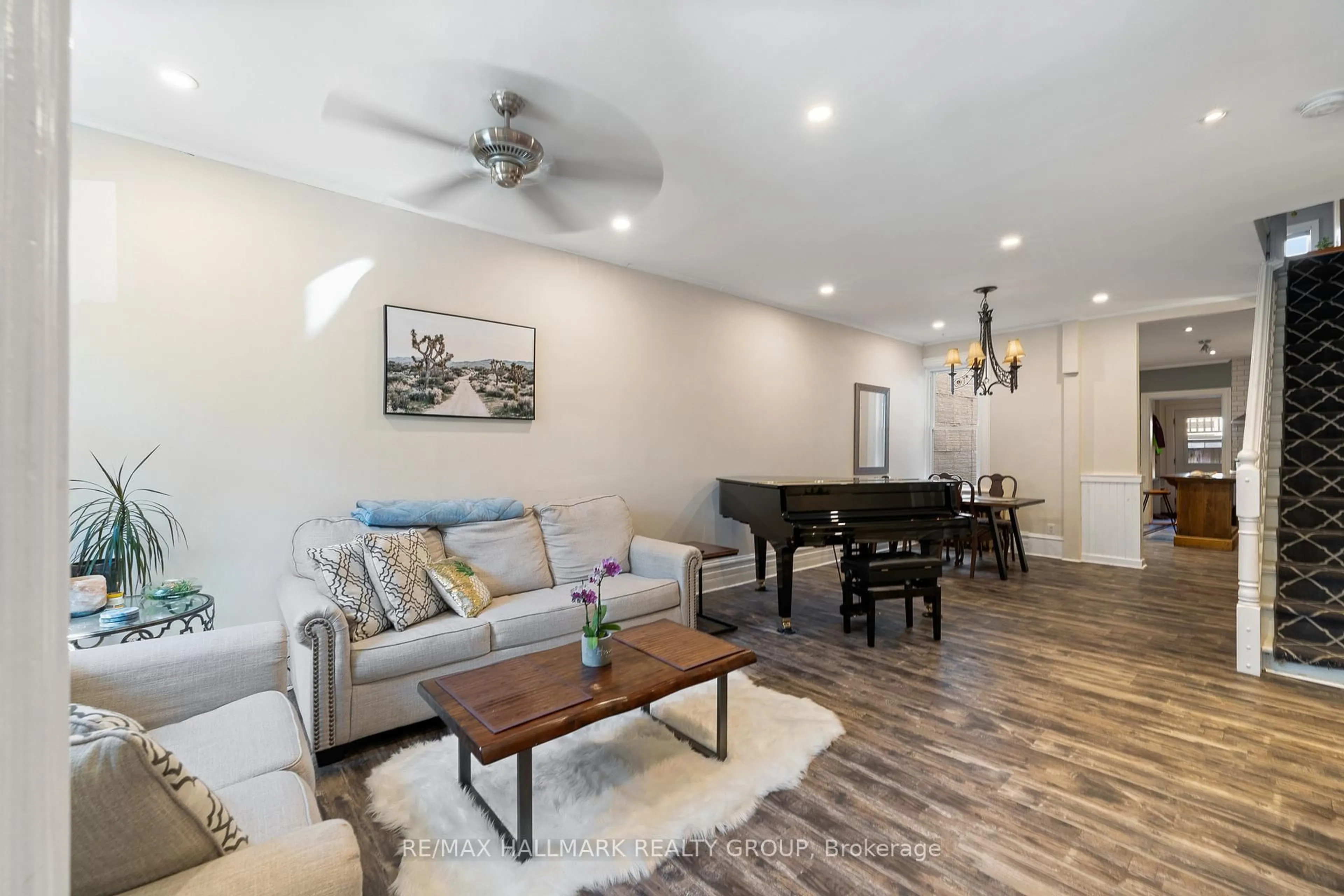 Living room with furniture, wood/laminate floor for 181 GUIGUES Ave, Ottawa Ontario K1N 5J1