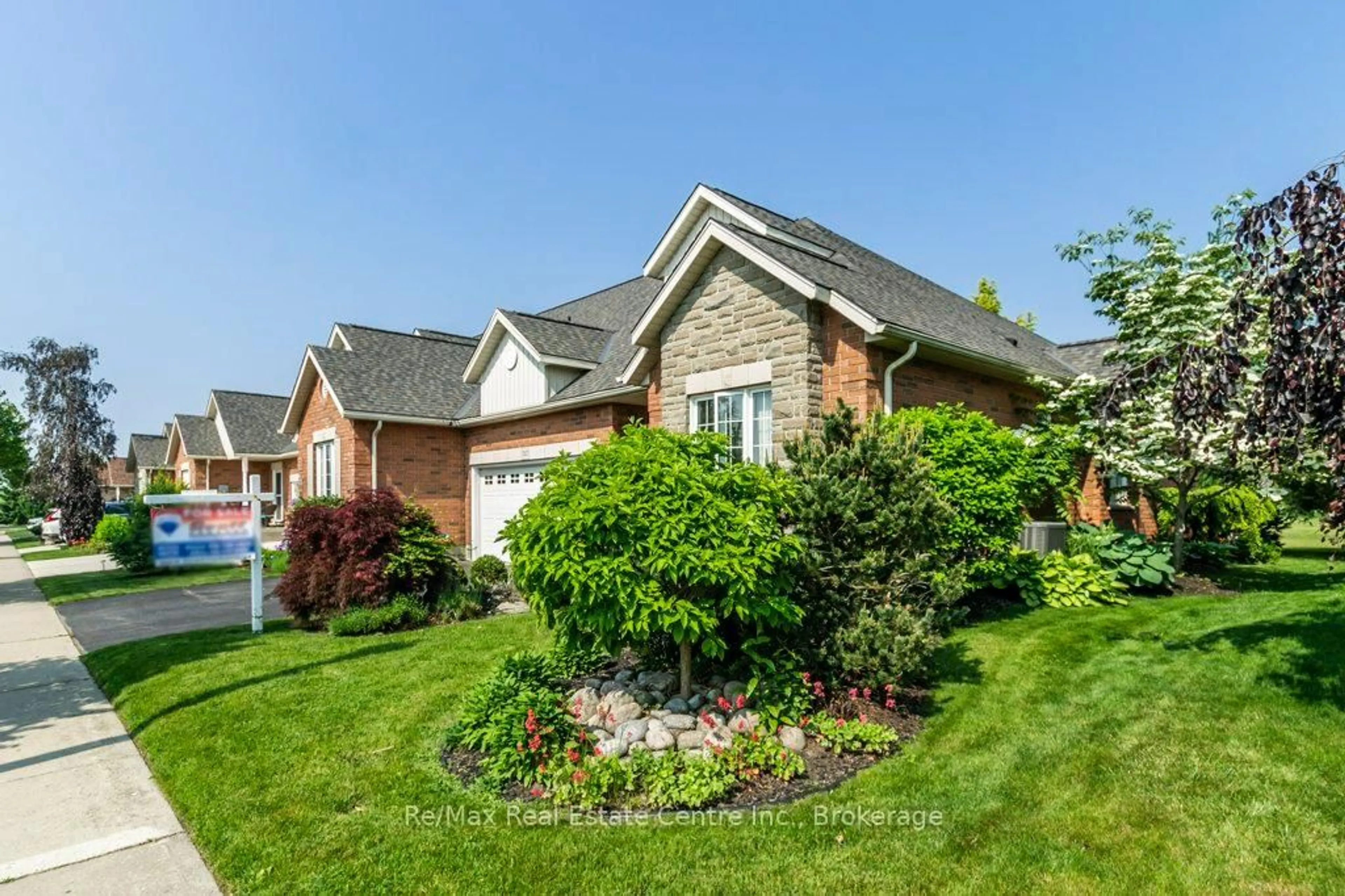Home with brick exterior material, street for 747 Garden Court Cres, Woodstock Ontario N4T 0A3