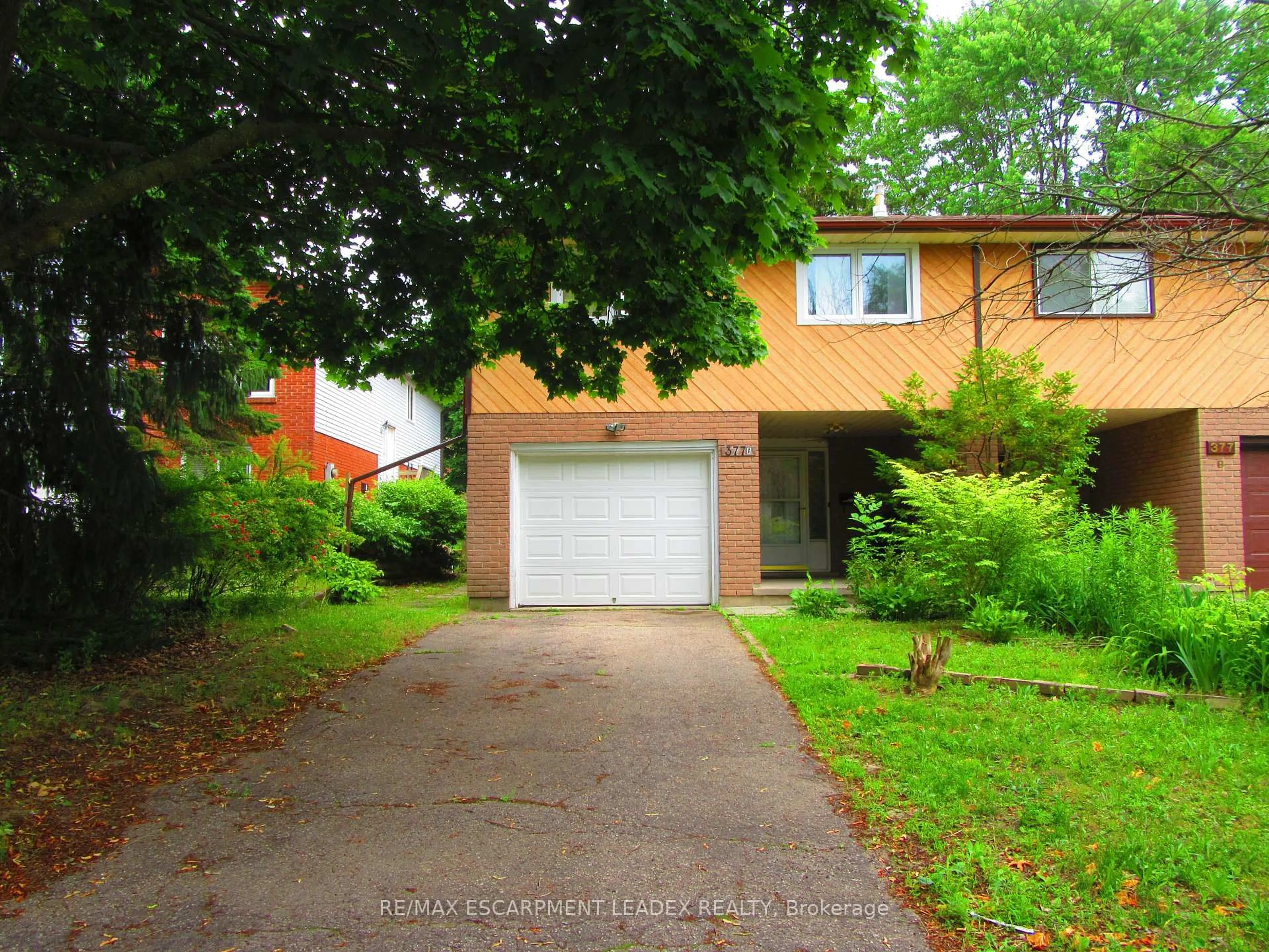 Home with brick exterior material, street for 377 CHURCHILL Crt #A, Waterloo Ontario N2L 6B4