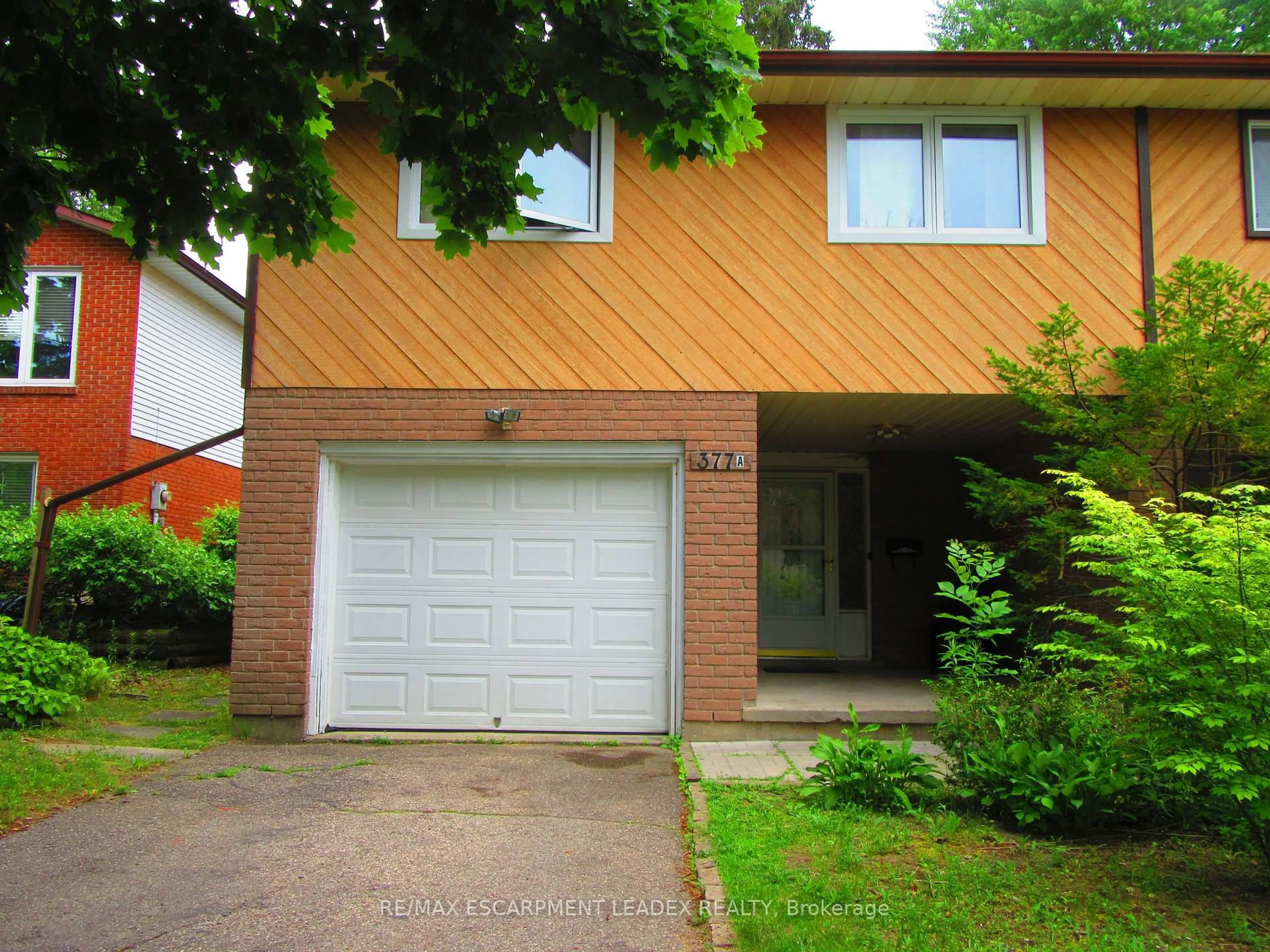 Home with brick exterior material, street for 377 CHURCHILL Crt #A, Waterloo Ontario N2L 6B4