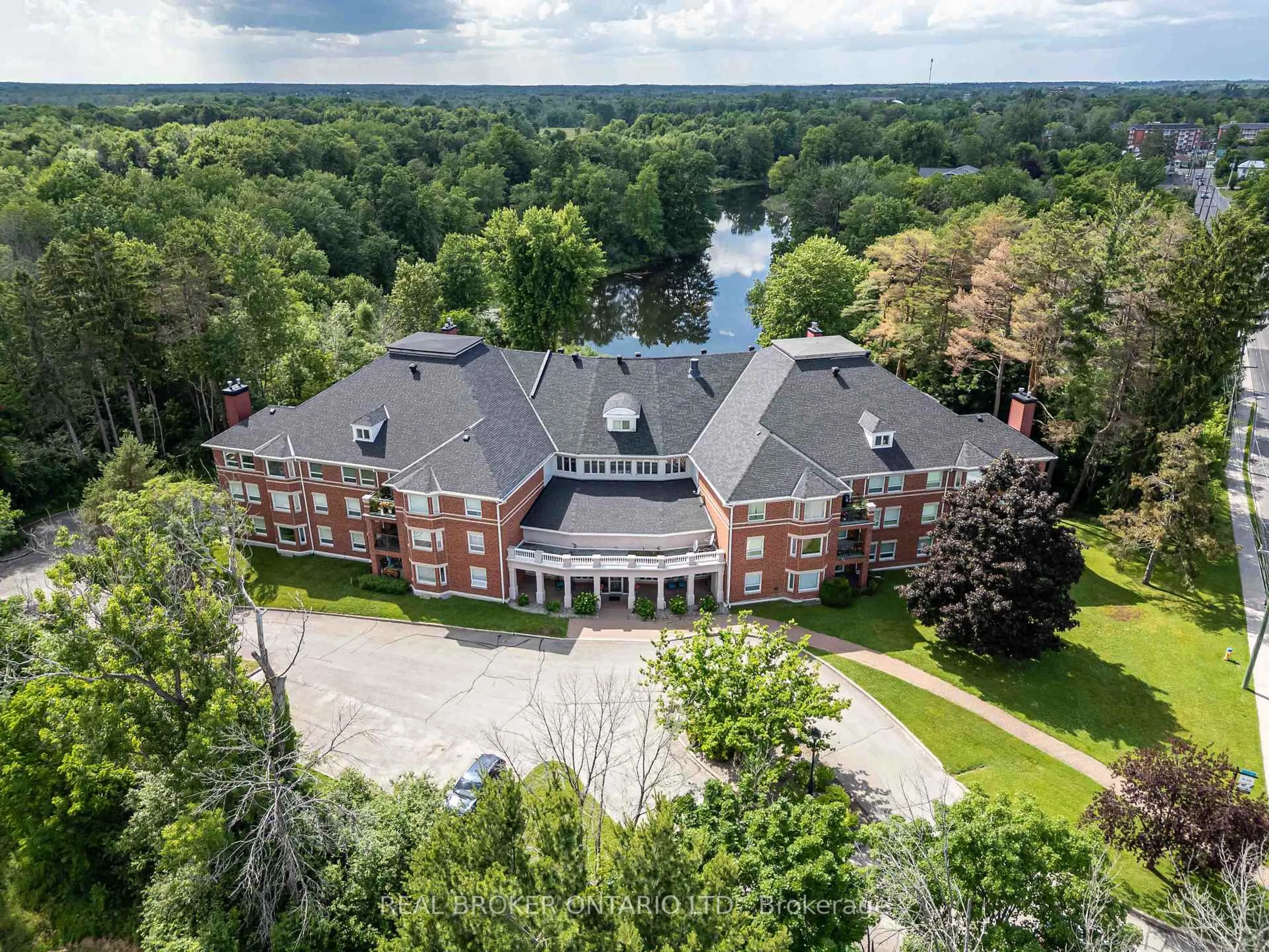 A pic from outside/outdoor area/front of a property/back of a property/a pic from drone, water/lake/river/ocean view for 23 Rogers Rd #202, Perth Ontario K7H 1P2