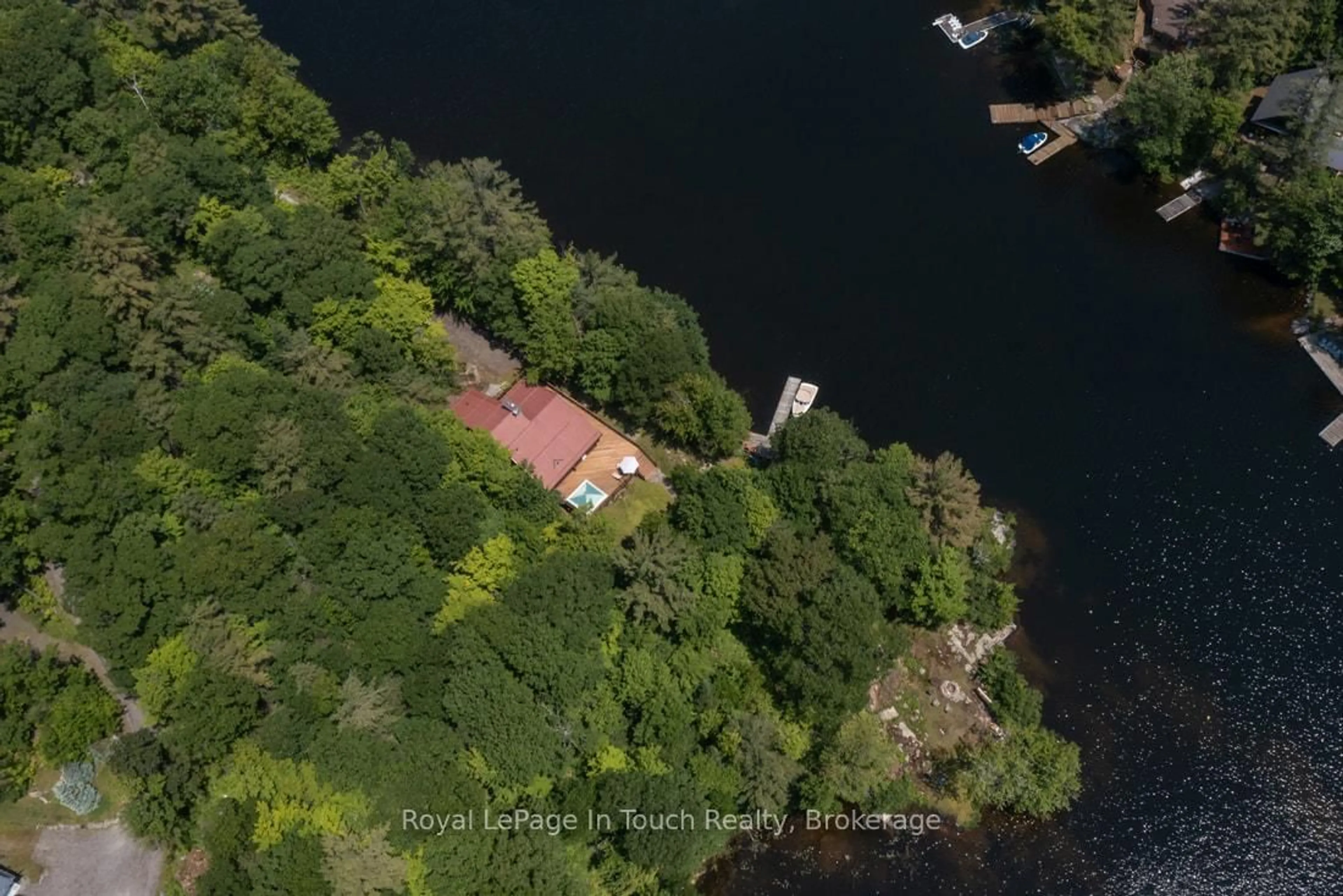 A pic from outside/outdoor area/front of a property/back of a property/a pic from drone, water/lake/river/ocean view for 212 Wild Rice Tr, Georgian Bay Ontario L0K 1S0