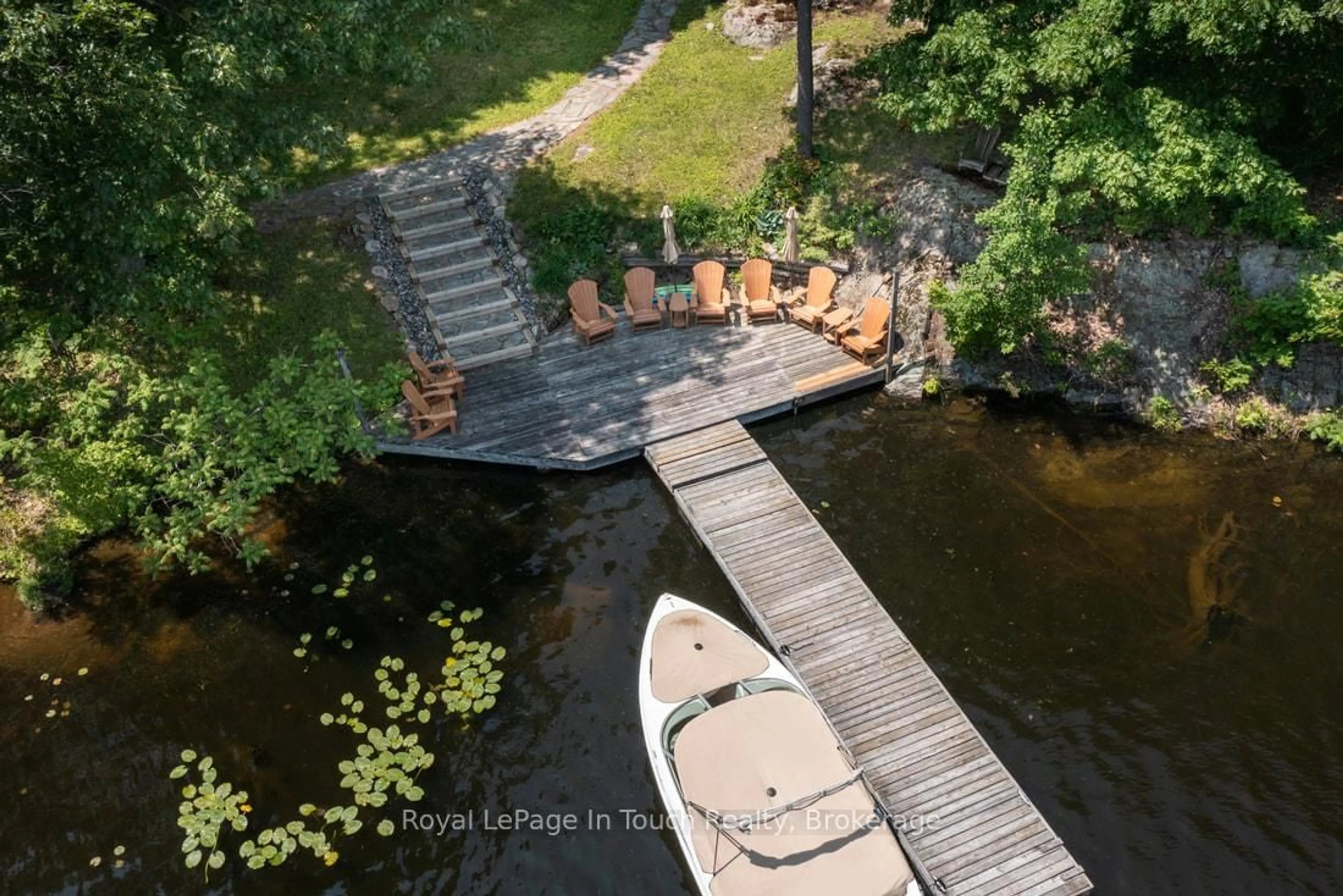A pic from outside/outdoor area/front of a property/back of a property/a pic from drone, water/lake/river/ocean view for 212 Wild Rice Tr, Georgian Bay Ontario L0K 1S0