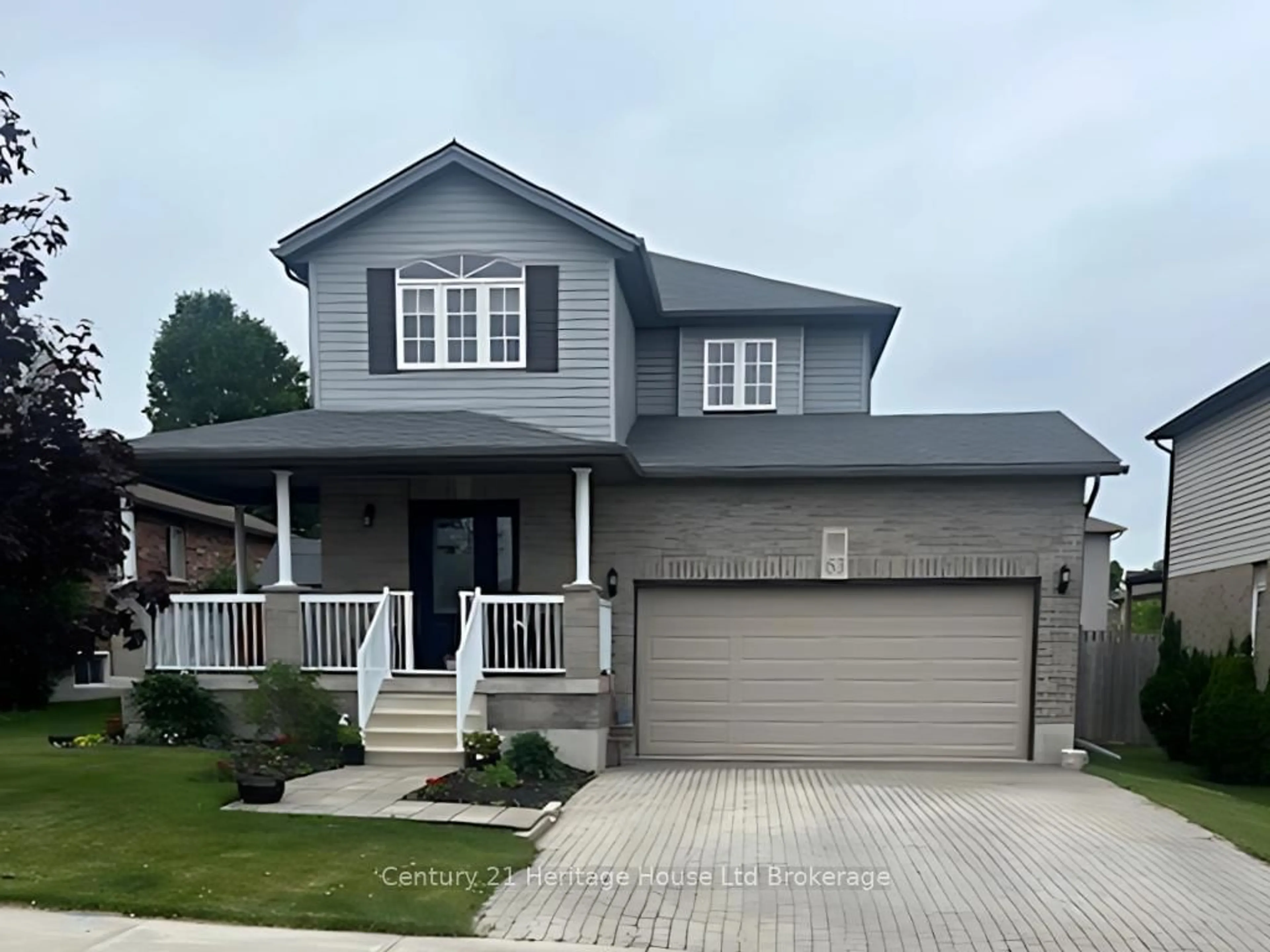 Home with vinyl exterior material, street for 63 Woodhatch Cres, Ingersoll Ontario N5C 0A3