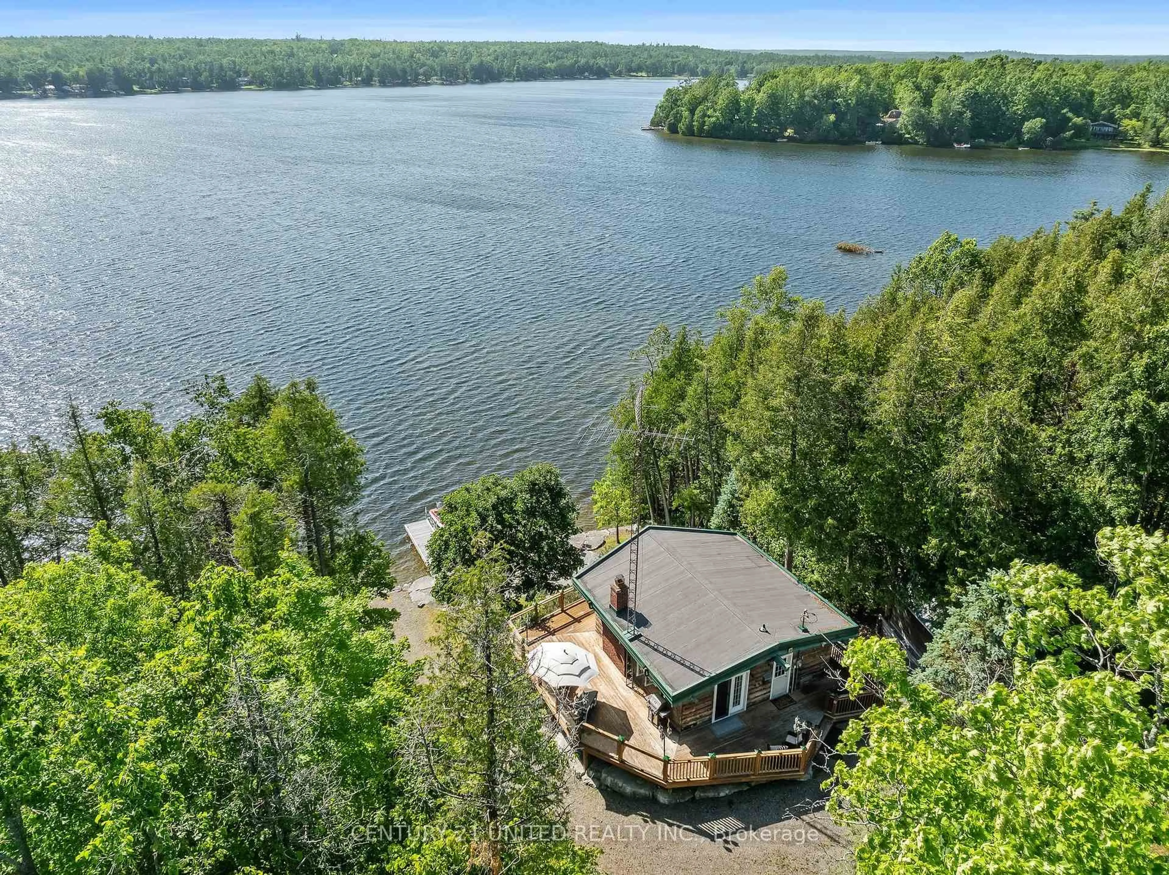 A pic from outside/outdoor area/front of a property/back of a property/a pic from drone, water/lake/river/ocean view for 1970 White Lake Rd, Douro-Dummer Ontario K0L 2H0