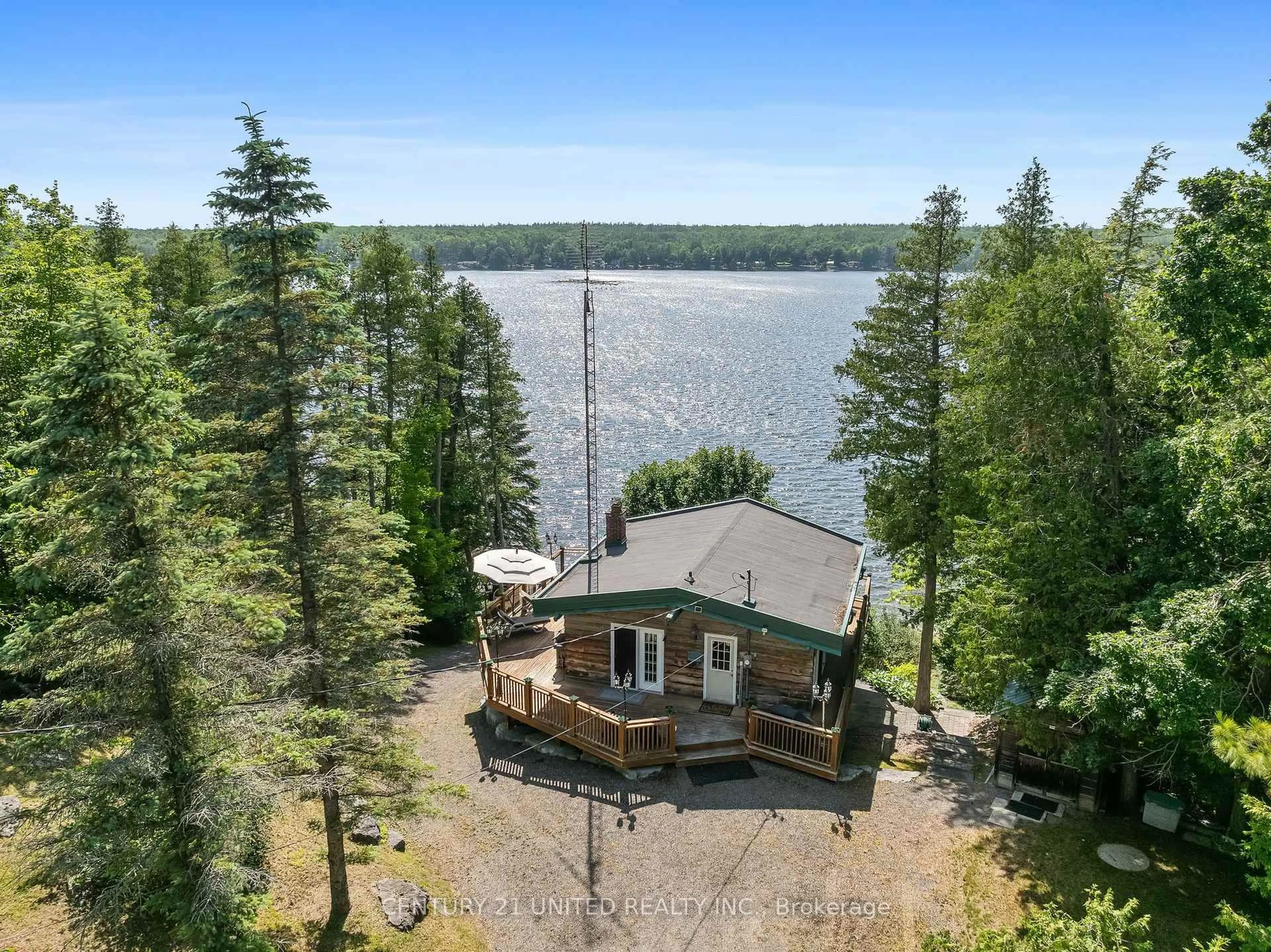 A pic from outside/outdoor area/front of a property/back of a property/a pic from drone, water/lake/river/ocean view for 1970 White Lake Rd, Douro-Dummer Ontario K0L 2H0