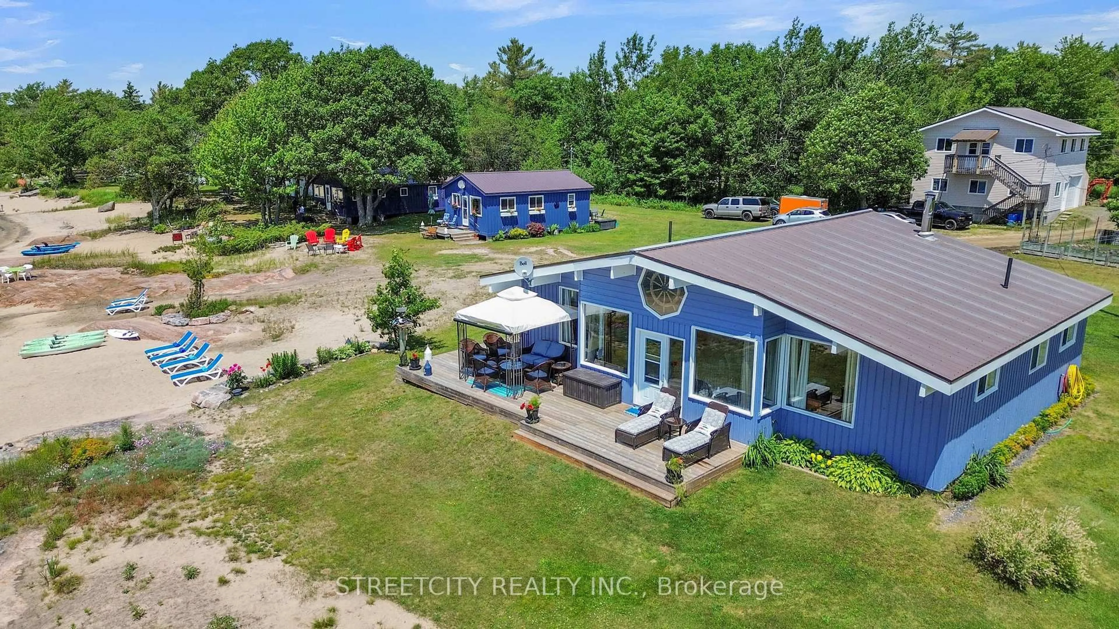 A pic from outside/outdoor area/front of a property/back of a property/a pic from drone, water/lake/river/ocean view for 35 Brooks Landing Rd, Carling Ontario P0G 1G0
