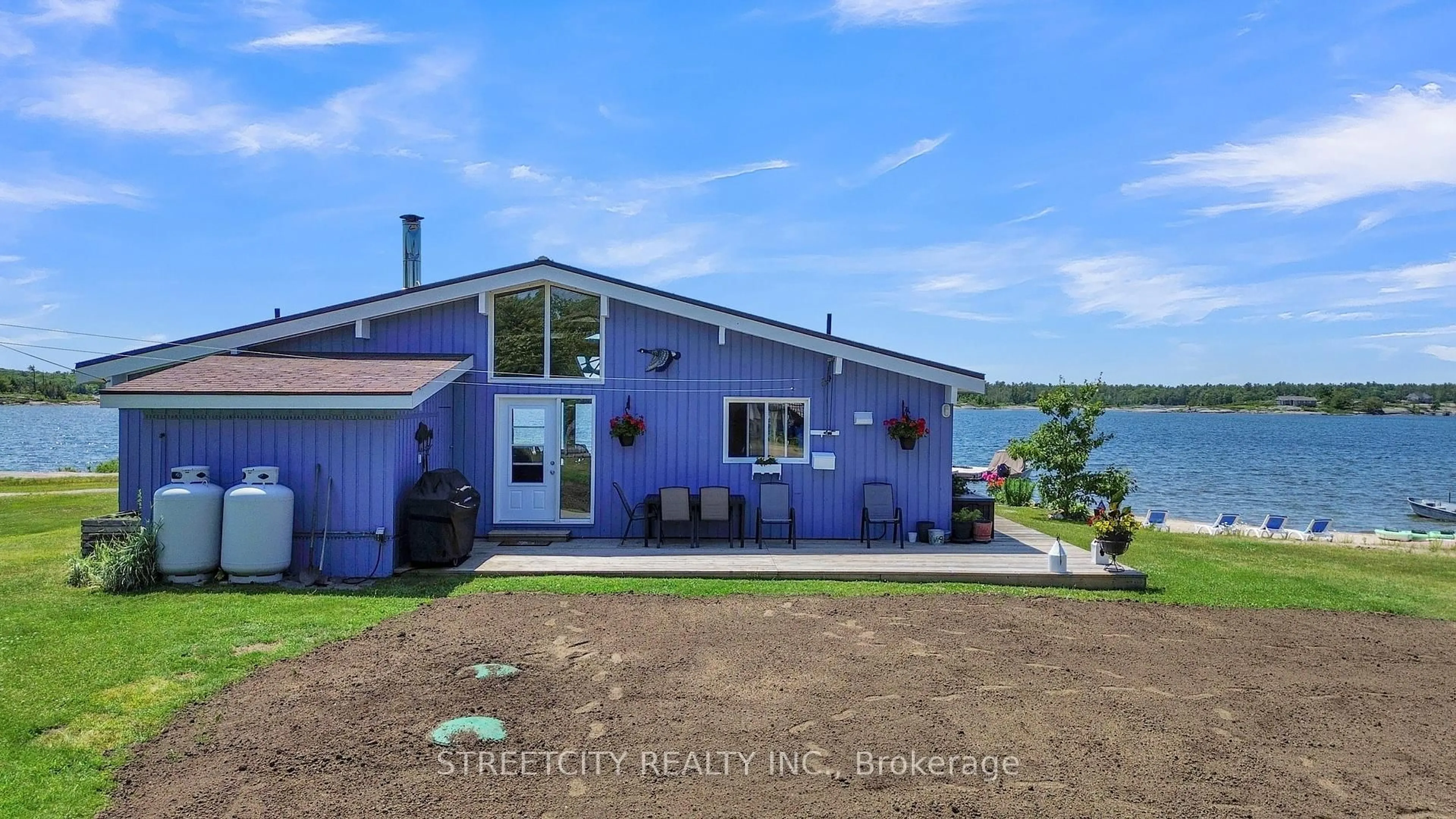 A pic from outside/outdoor area/front of a property/back of a property/a pic from drone, water/lake/river/ocean view for 35 Brooks Landing Rd, Carling Ontario P0G 1G0