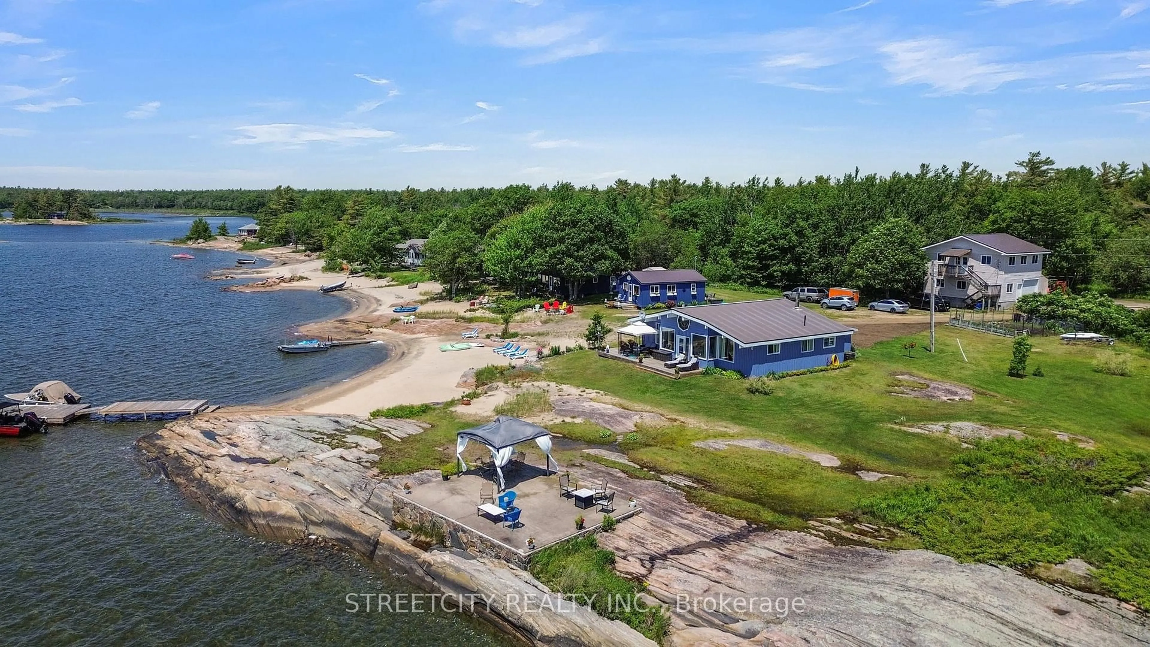 A pic from outside/outdoor area/front of a property/back of a property/a pic from drone, water/lake/river/ocean view for 35 Brooks Landing Rd, Carling Ontario P0G 1G0