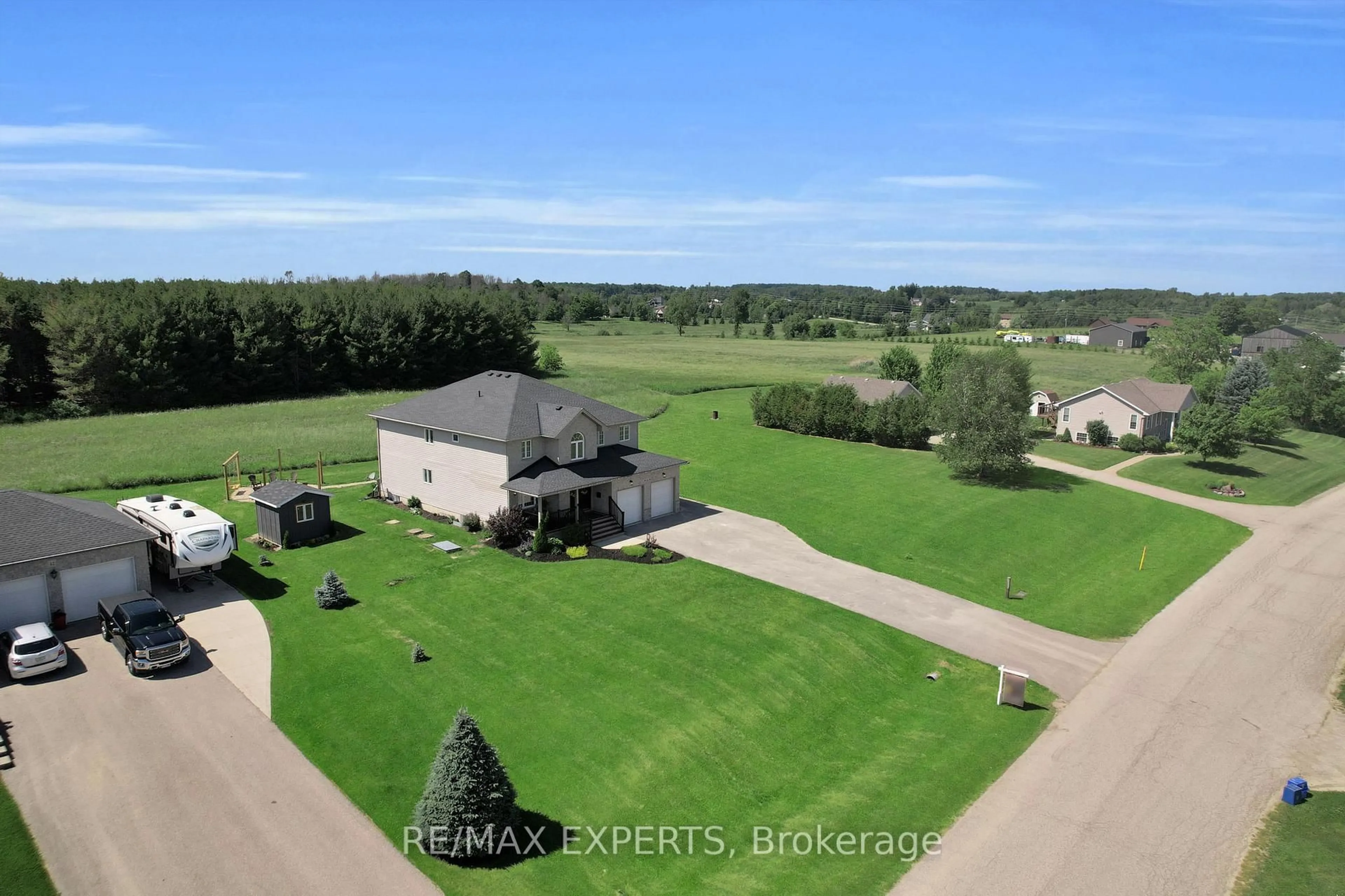 A pic from outside/outdoor area/front of a property/back of a property/a pic from drone, water/lake/river/ocean view for 46 Scenic Dr, Mapleton Ontario N0B 1A0