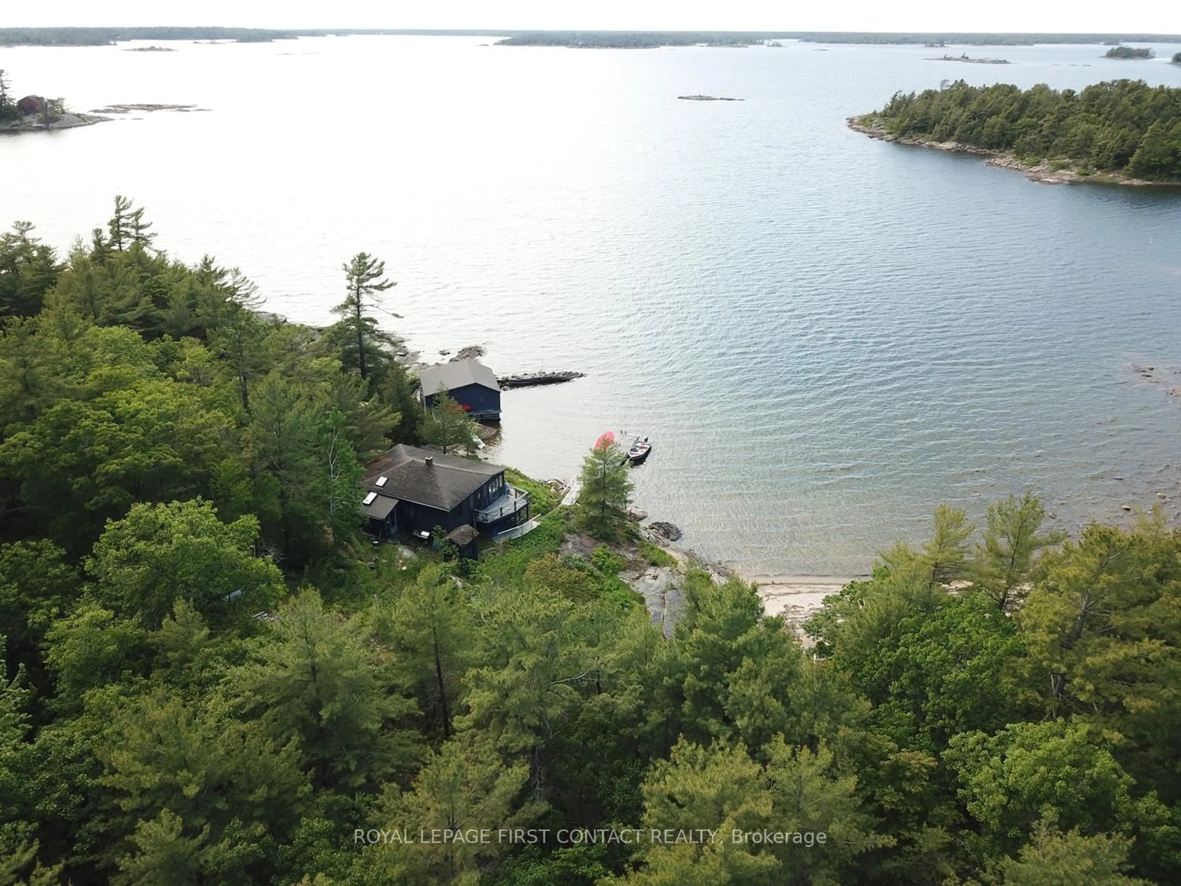 A pic from outside/outdoor area/front of a property/back of a property/a pic from drone, water/lake/river/ocean view for 25 Shawanaga Landing Rd, The Archipelago Ontario P0G 1K0