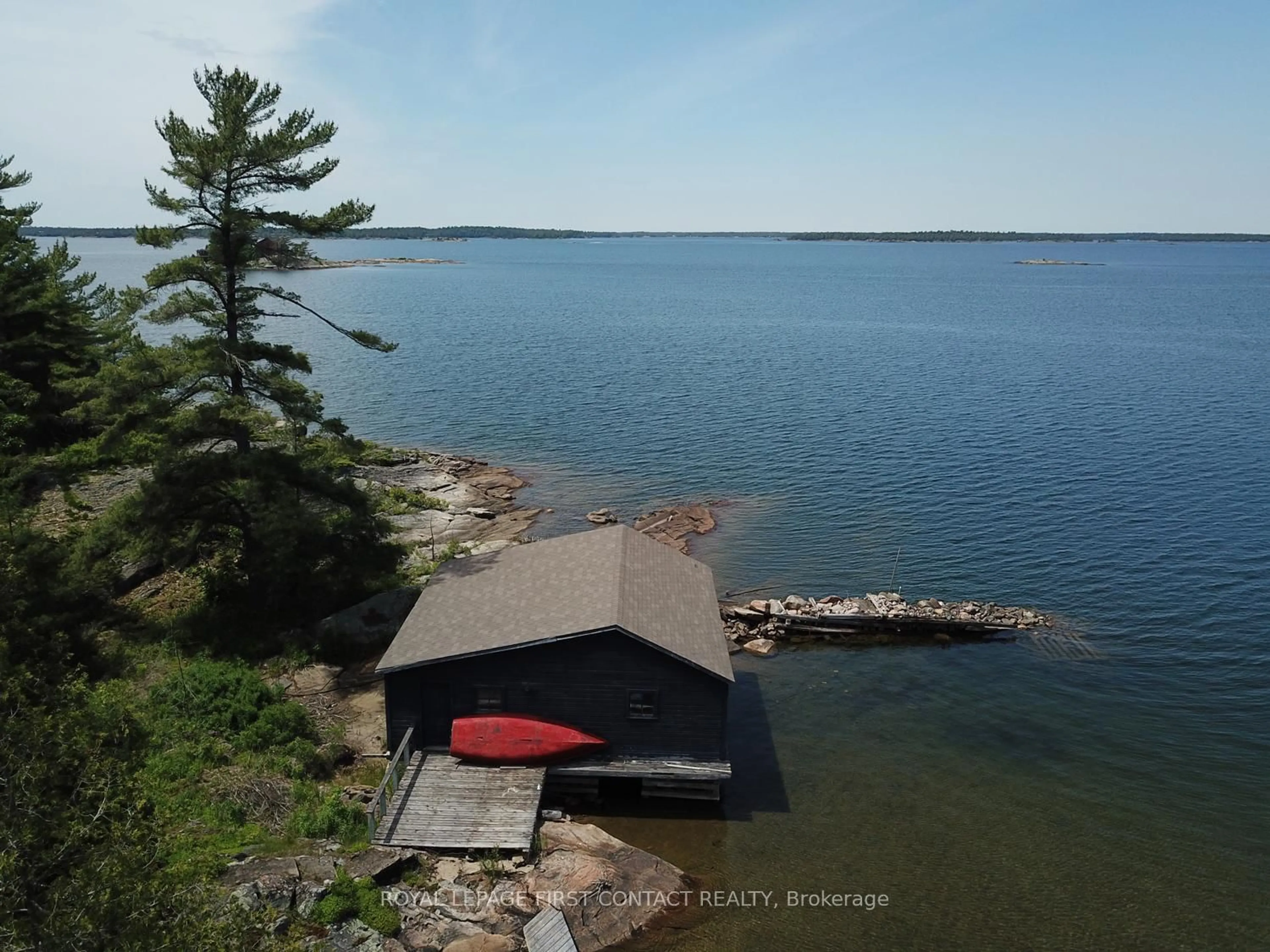A pic from outside/outdoor area/front of a property/back of a property/a pic from drone, water/lake/river/ocean view for 25 Shawanaga Landing Rd, The Archipelago Ontario P0G 1K0