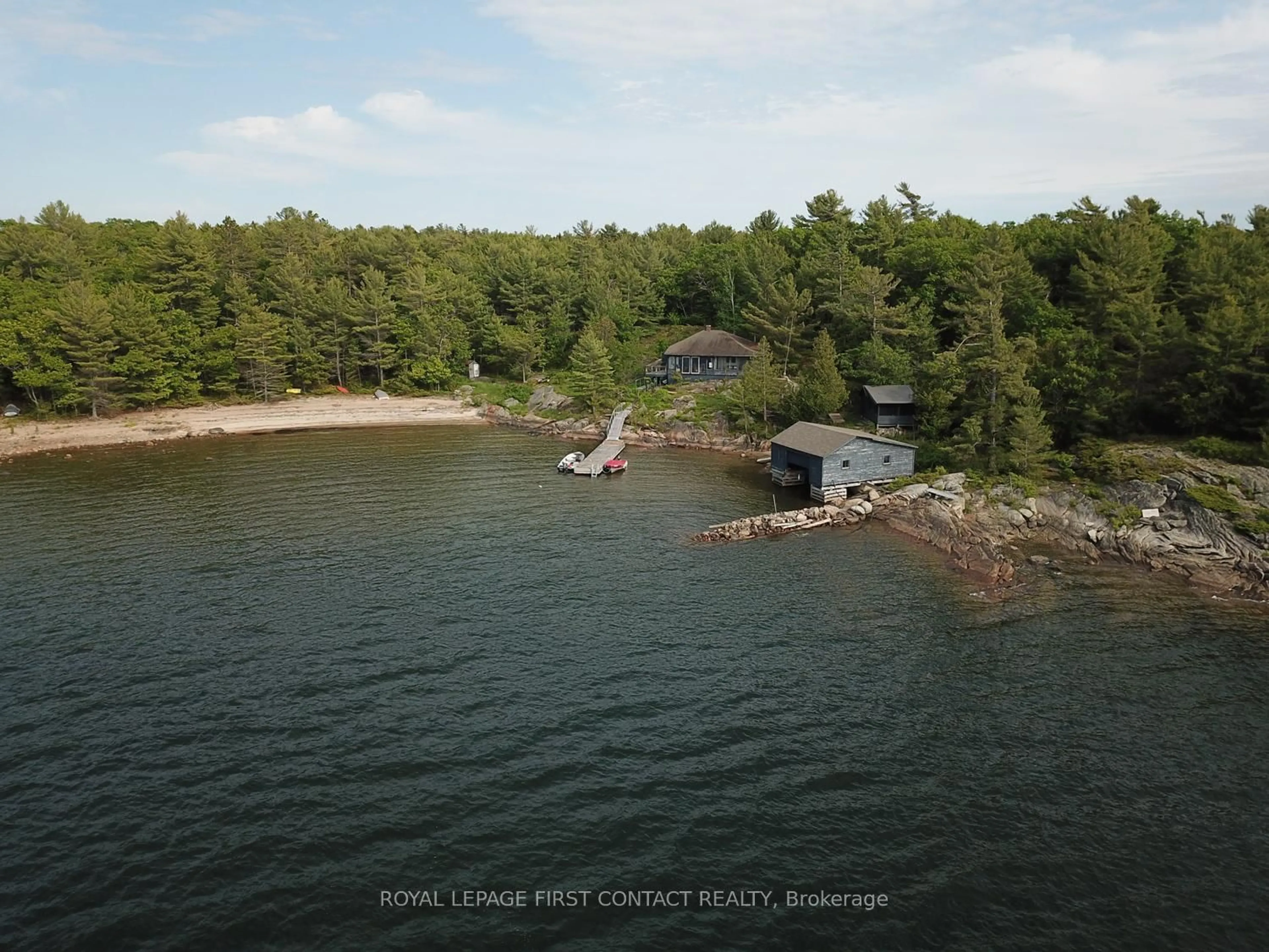 A pic from outside/outdoor area/front of a property/back of a property/a pic from drone, water/lake/river/ocean view for 25 Shawanaga Landing Rd, The Archipelago Ontario P0G 1K0