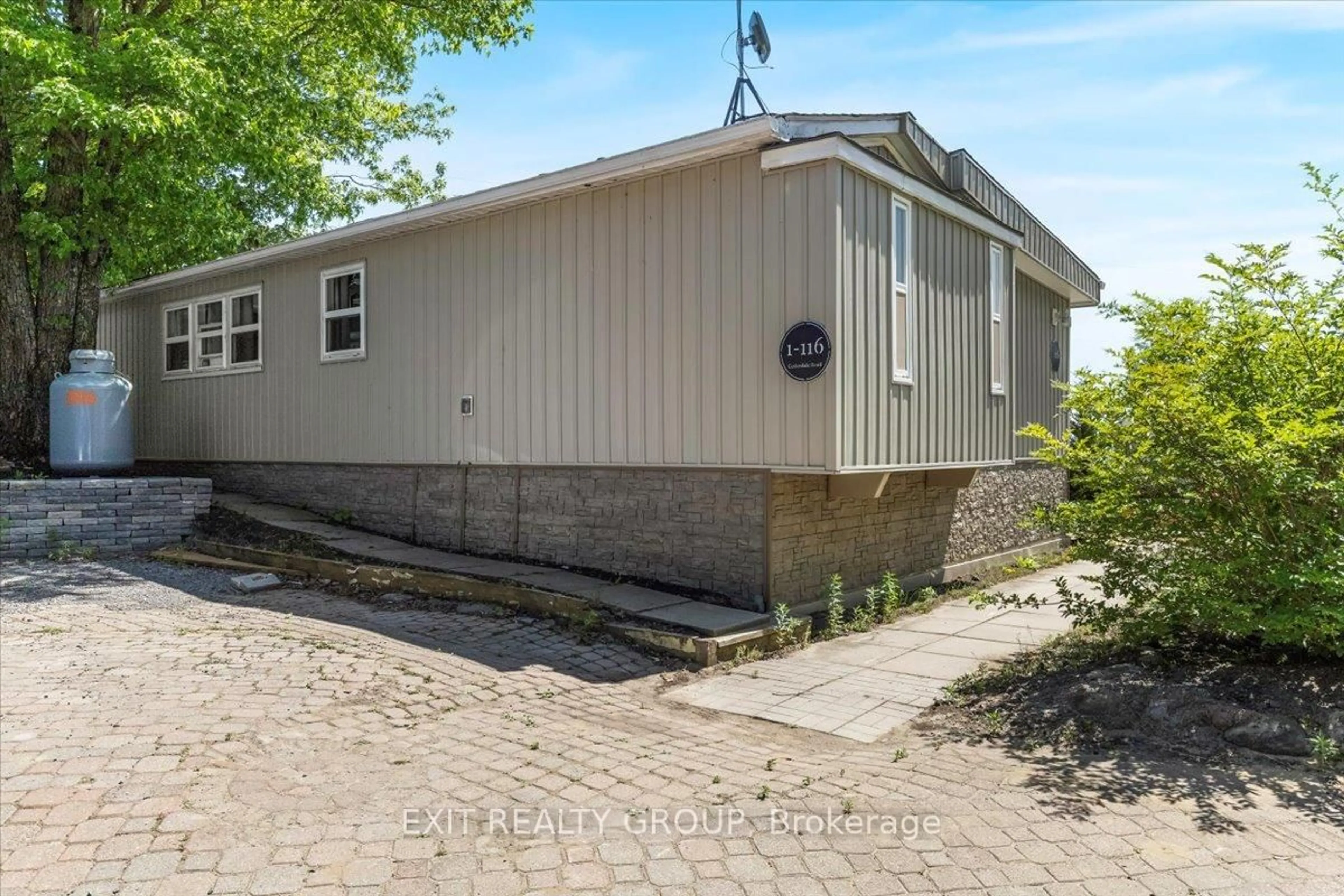 A pic from outside/outdoor area/front of a property/back of a property/a pic from drone, street for 116 Cedardale Rd #1, Brighton Ontario K0K 1H0
