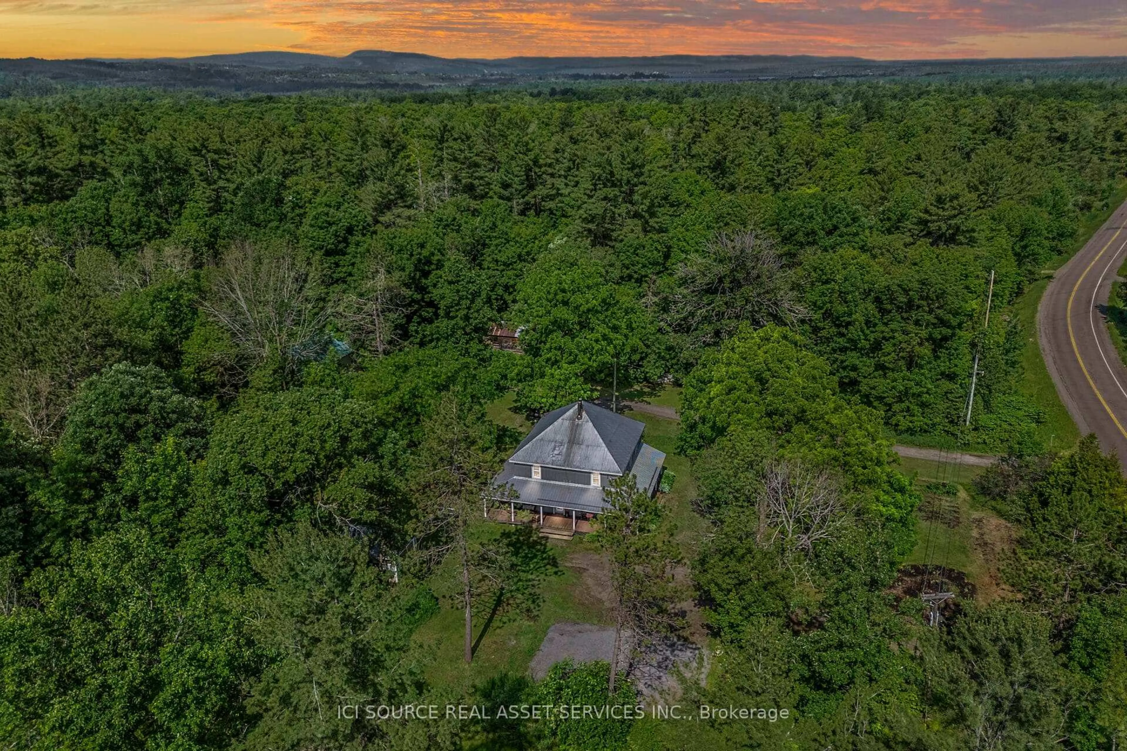 A pic from outside/outdoor area/front of a property/back of a property/a pic from drone, forest/trees view for 11571 Lanark Rd, Calabogie Ontario K0J 1H0