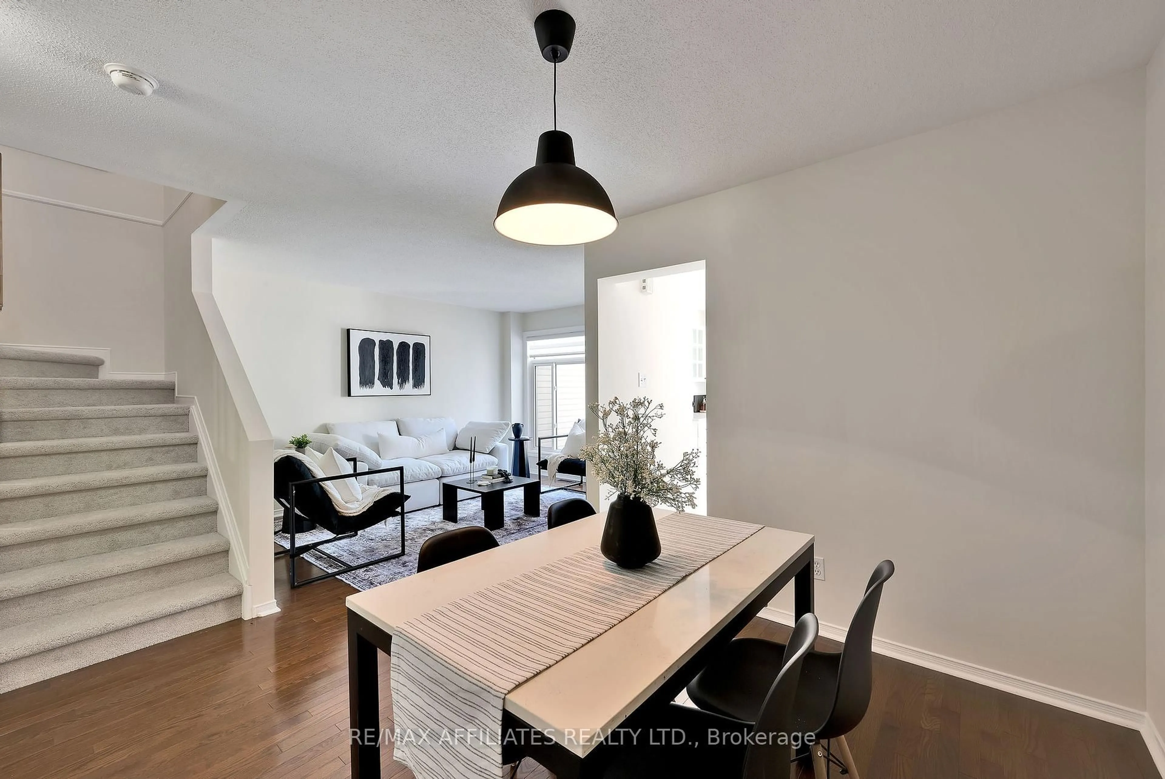 Dining room, wood/laminate floor for 21 Flowertree Cres, Kanata Ontario K2M 2R8