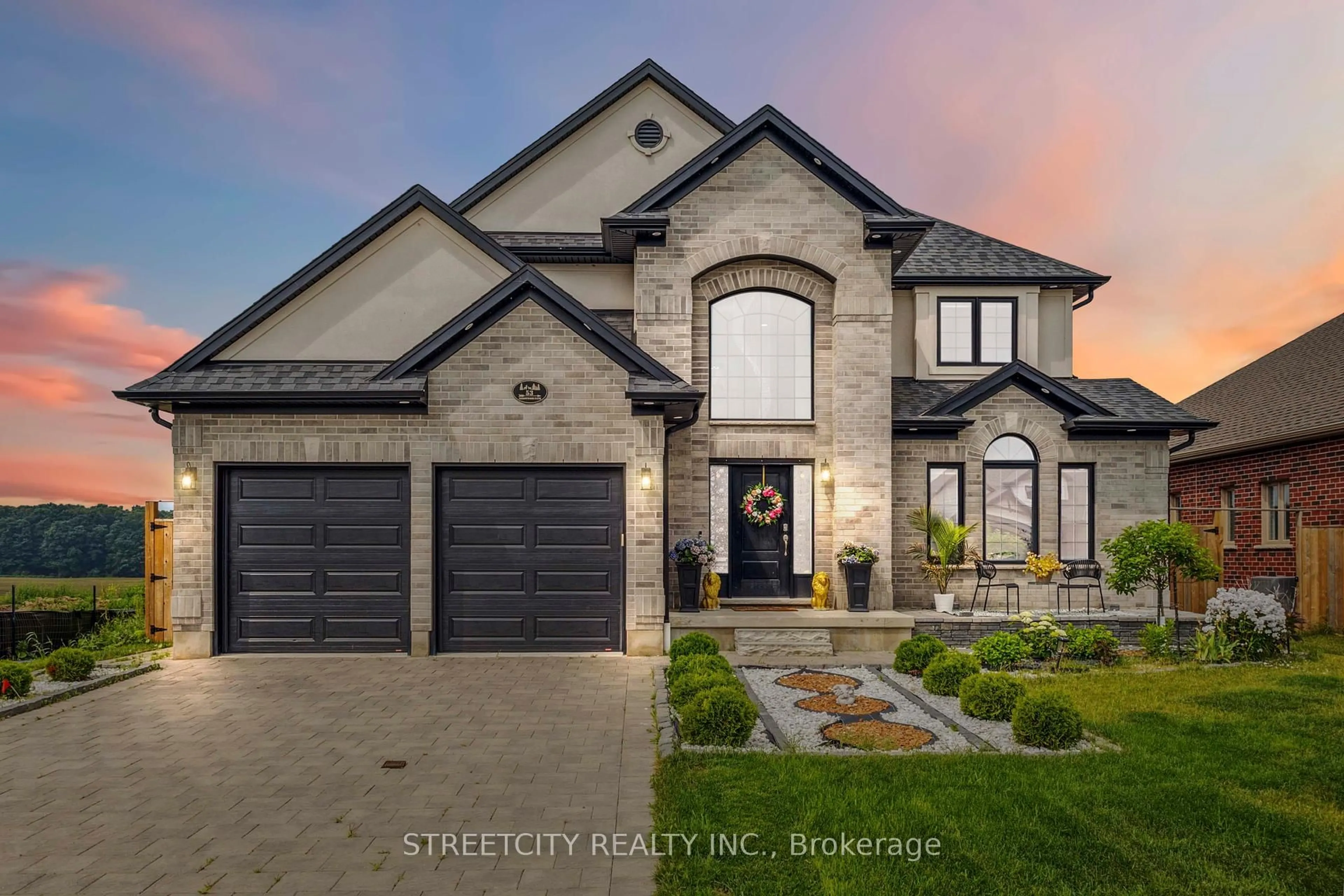 Home with brick exterior material, street for 53 Arrowwood Path, Middlesex Centre Ontario N0M 2A0