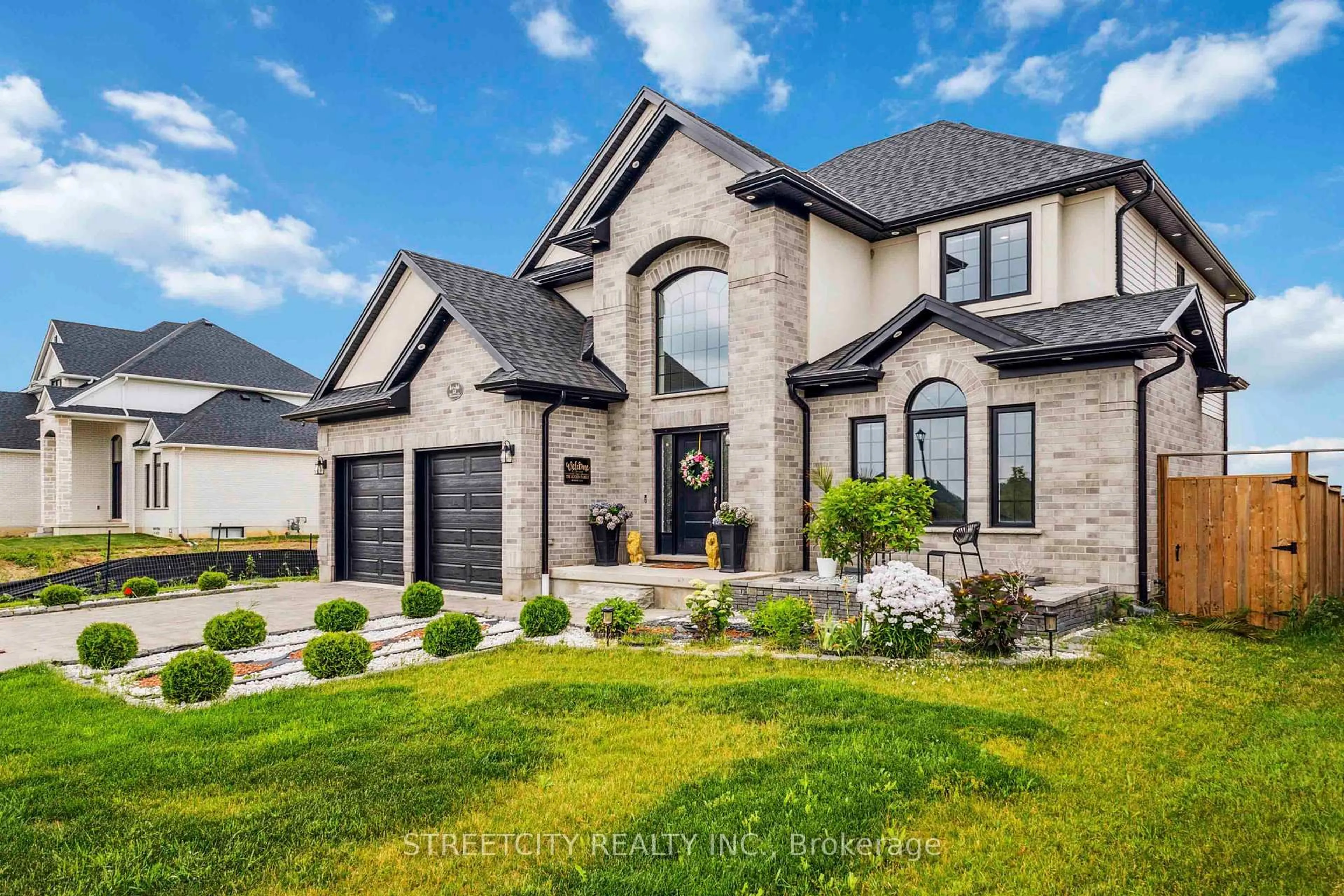 Home with brick exterior material, street for 53 Arrowwood Path, Middlesex Centre Ontario N0M 2A0